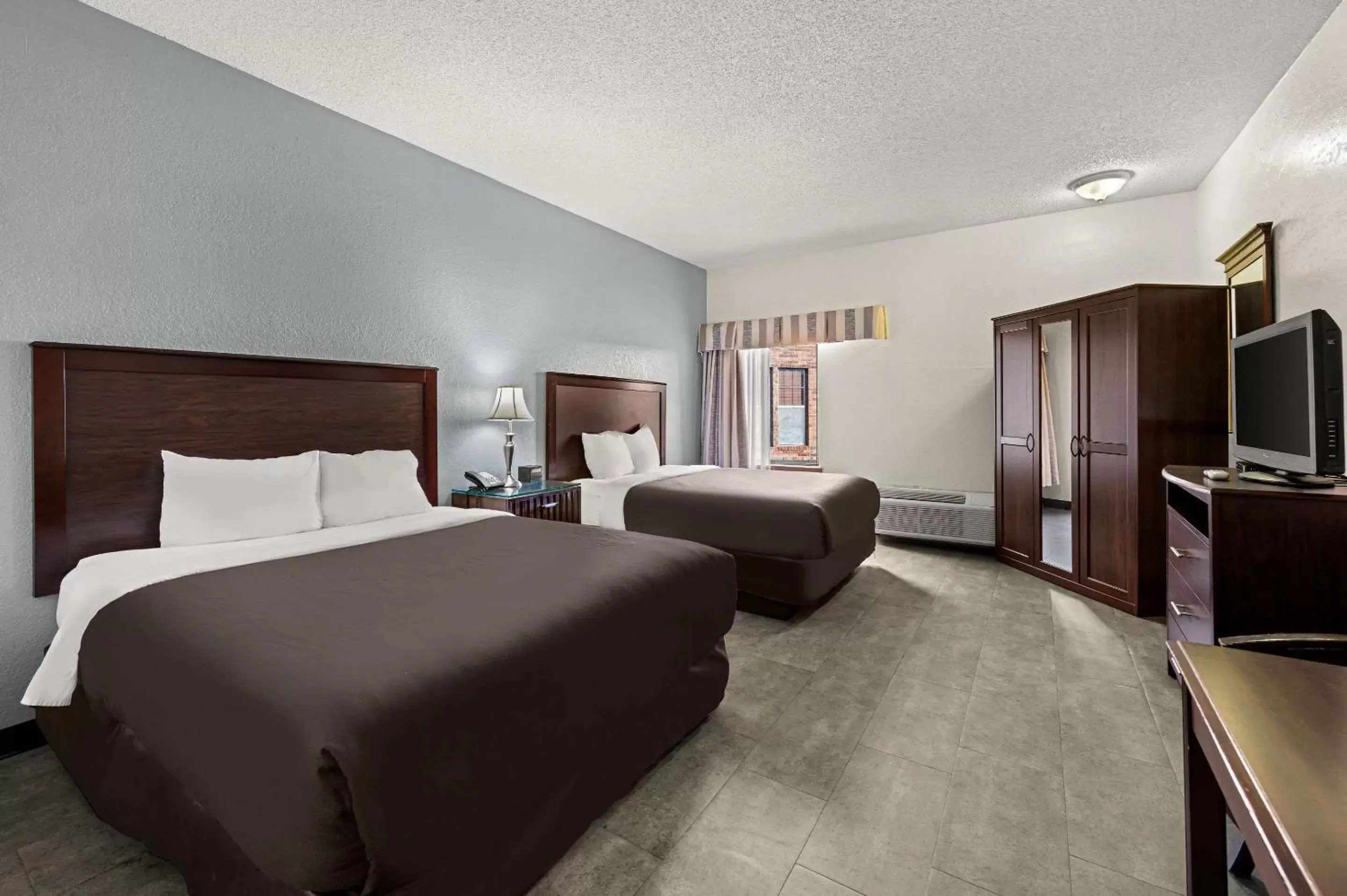 Queen Room with Two Queen Beds and Accessible Tub - Accessible/Non-Smoking in Suburban Studios Kansas City Airport North Queen Room with Two Queen Beds and Accessible Tub - Accessible/Non-Smoking in Suburban Studios Kansas City Airport North