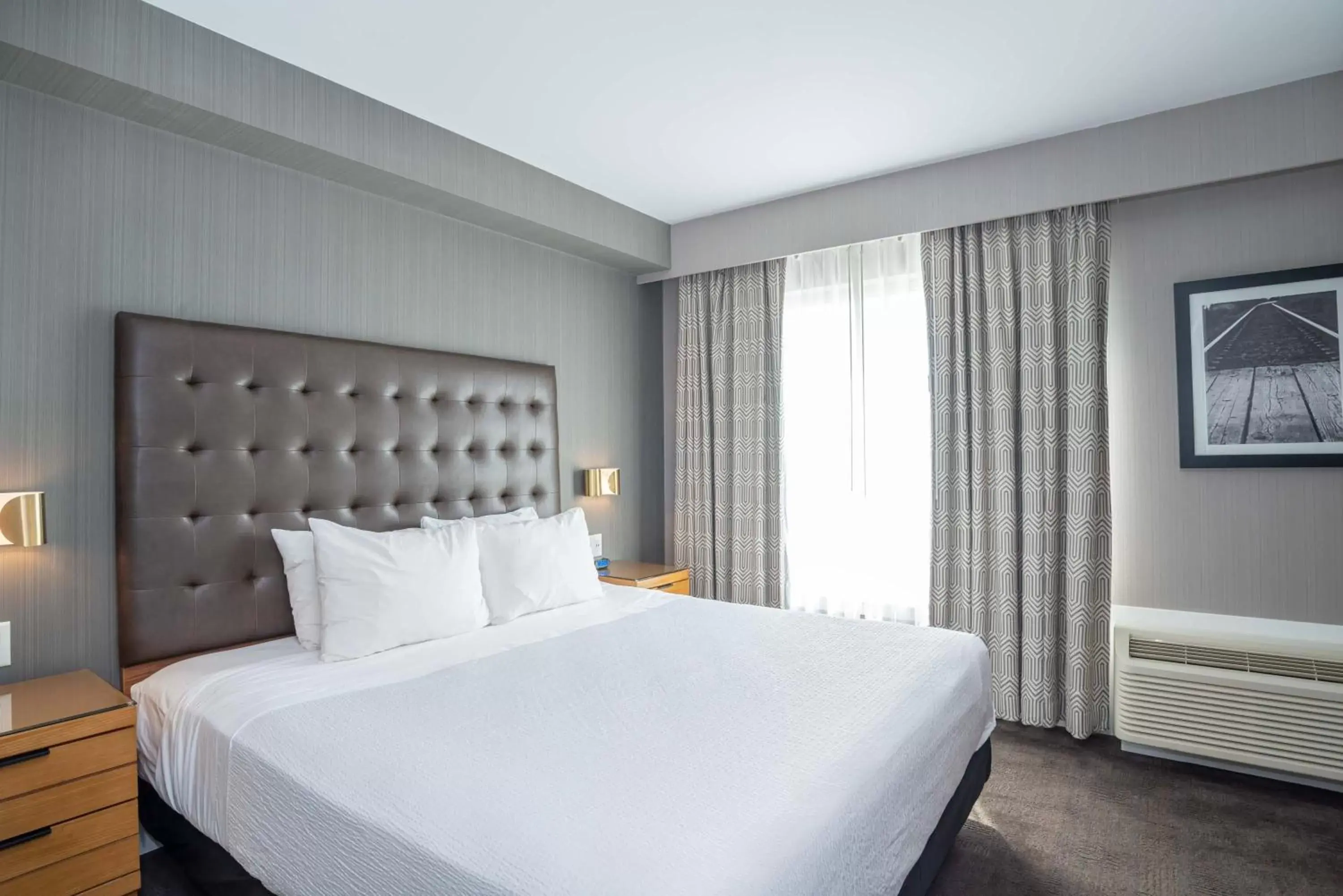 Standard Suite, 1 King Bed, Sofa Bed, Kitchenette in Sandman Hotel Hamilton Standard Suite, 1 King Bed, Sofa Bed, Kitchenette in Sandman Hotel Hamilton