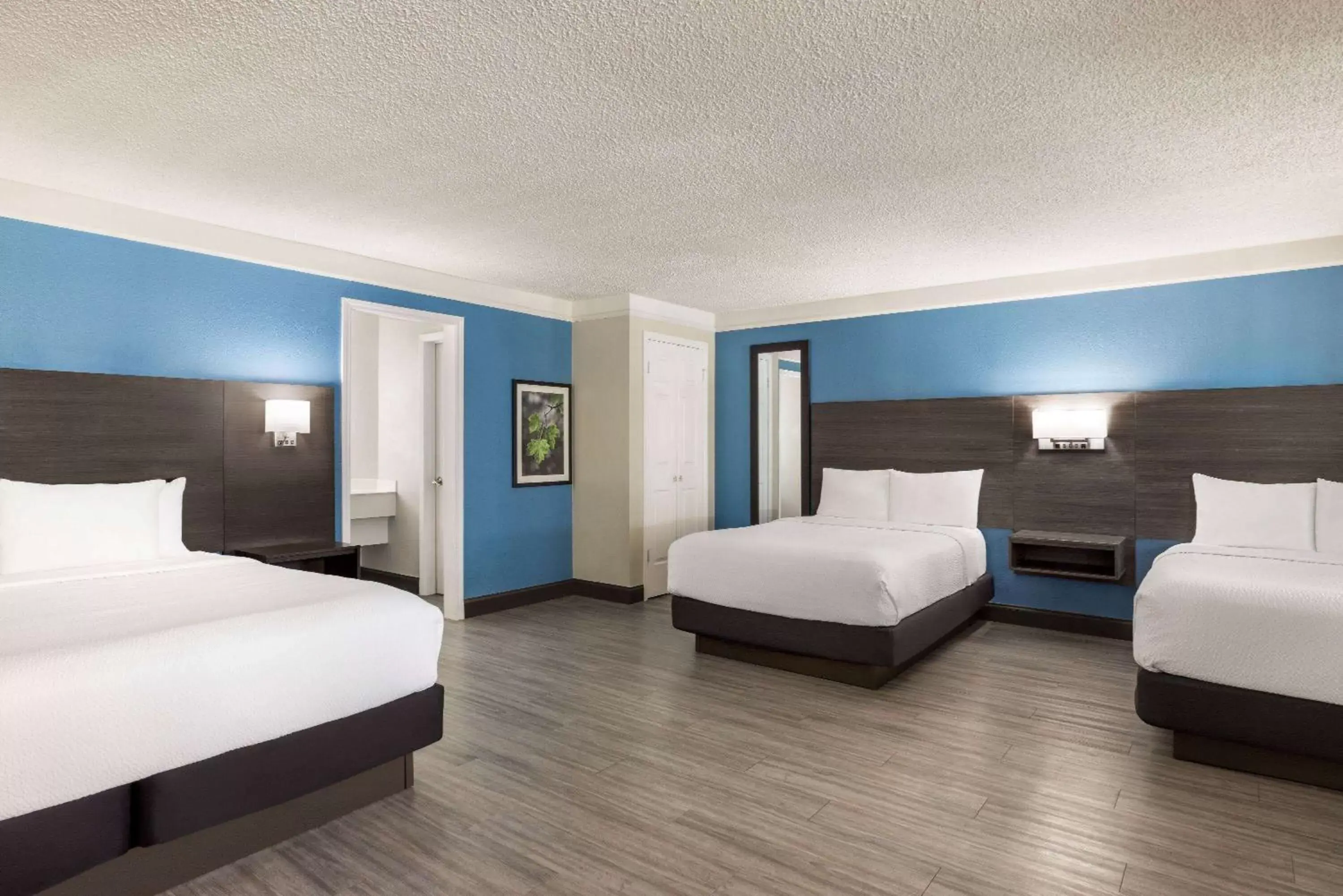 Family Suite with One King and Two Double Beds in La Quinta Inn by Wyndham San Antonio I-35 N at Toepperwein Family Suite with One King and Two Double Beds in La Quinta Inn by Wyndham San Antonio I-35 N at Toepperwein