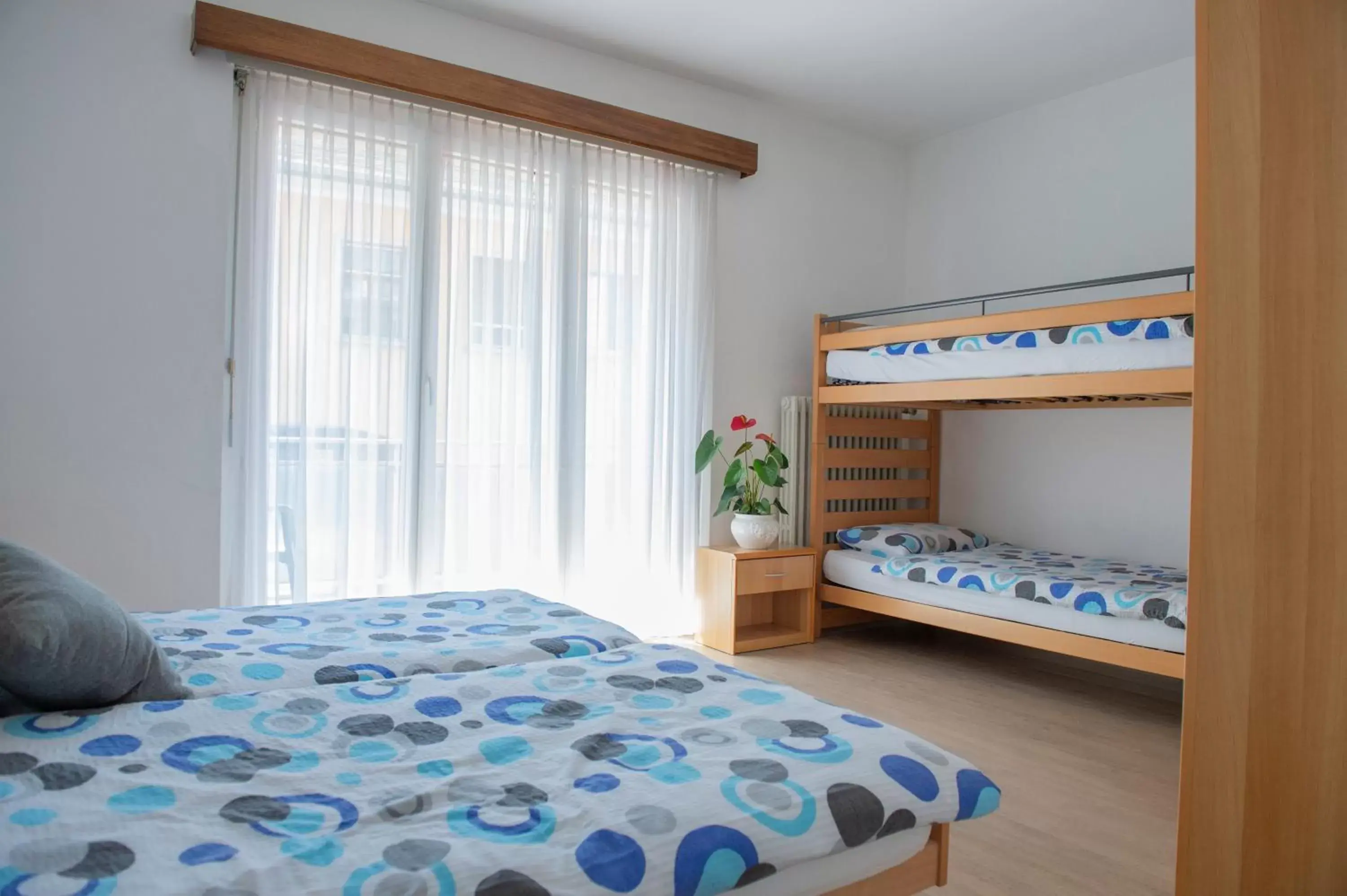 Quadruple Room with Shared Bathroom in Garni Moderno Quadruple Room with Shared Bathroom in Garni Moderno
