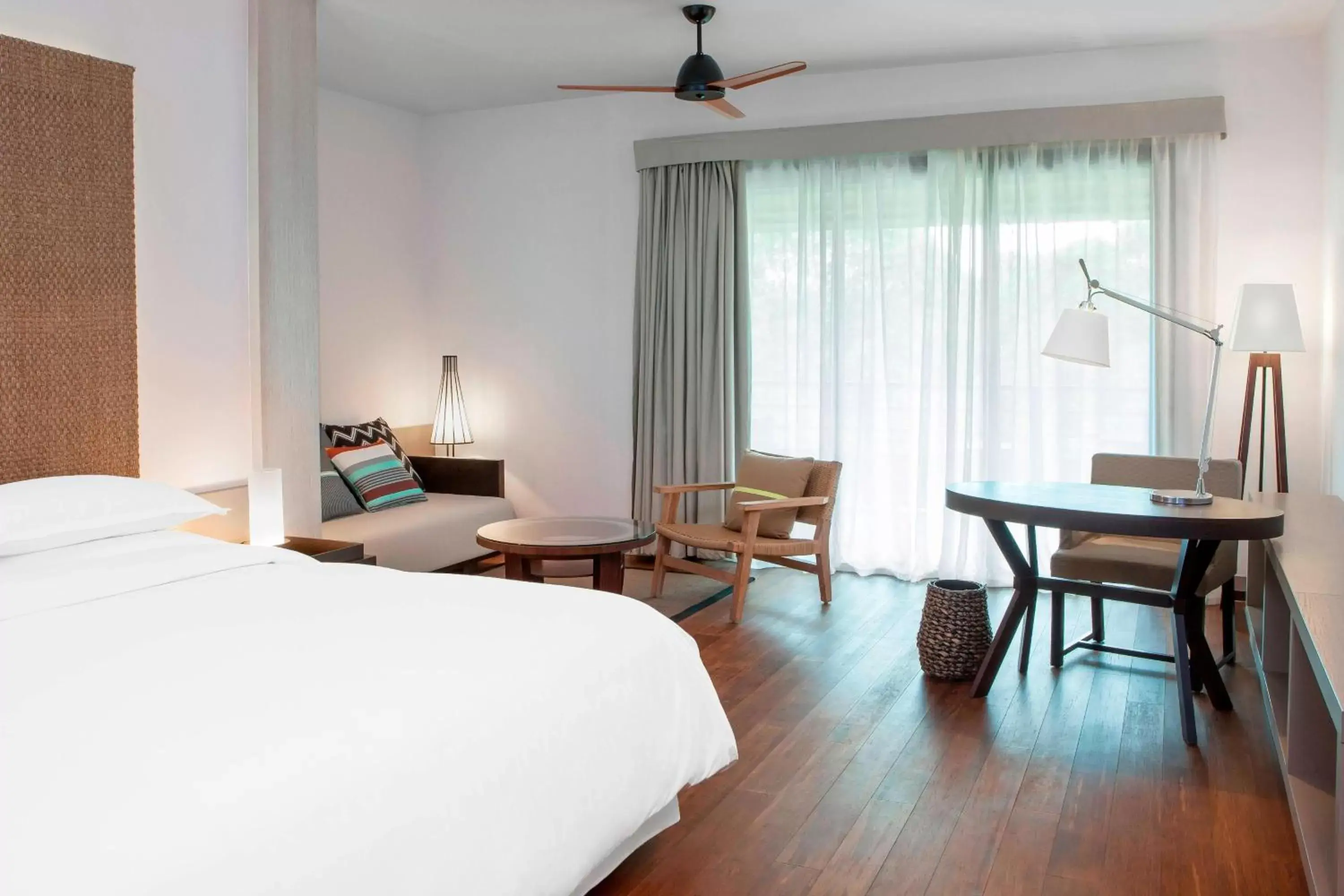 Larger Guest Room, 1 King, Sofa Bed, Garden View, Balcony in Sheraton New Caledonia Deva Spa & Golf Resort Larger Guest Room, 1 King, Sofa Bed, Garden View, Balcony in Sheraton New Caledonia Deva Spa & Golf Resort