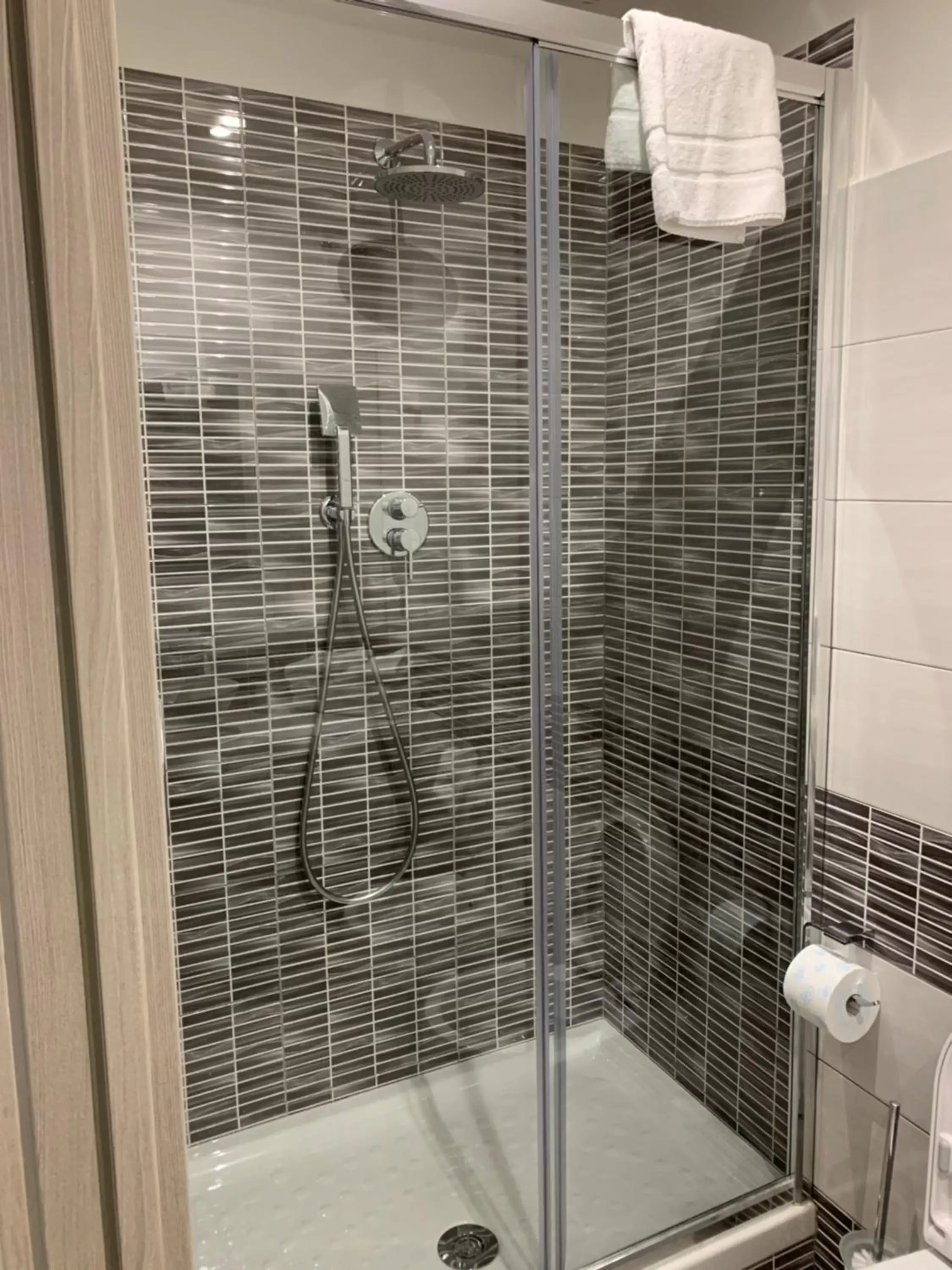 Superior Quadruple Room in Hotel Assarotti Superior Quadruple Room in Hotel Assarotti