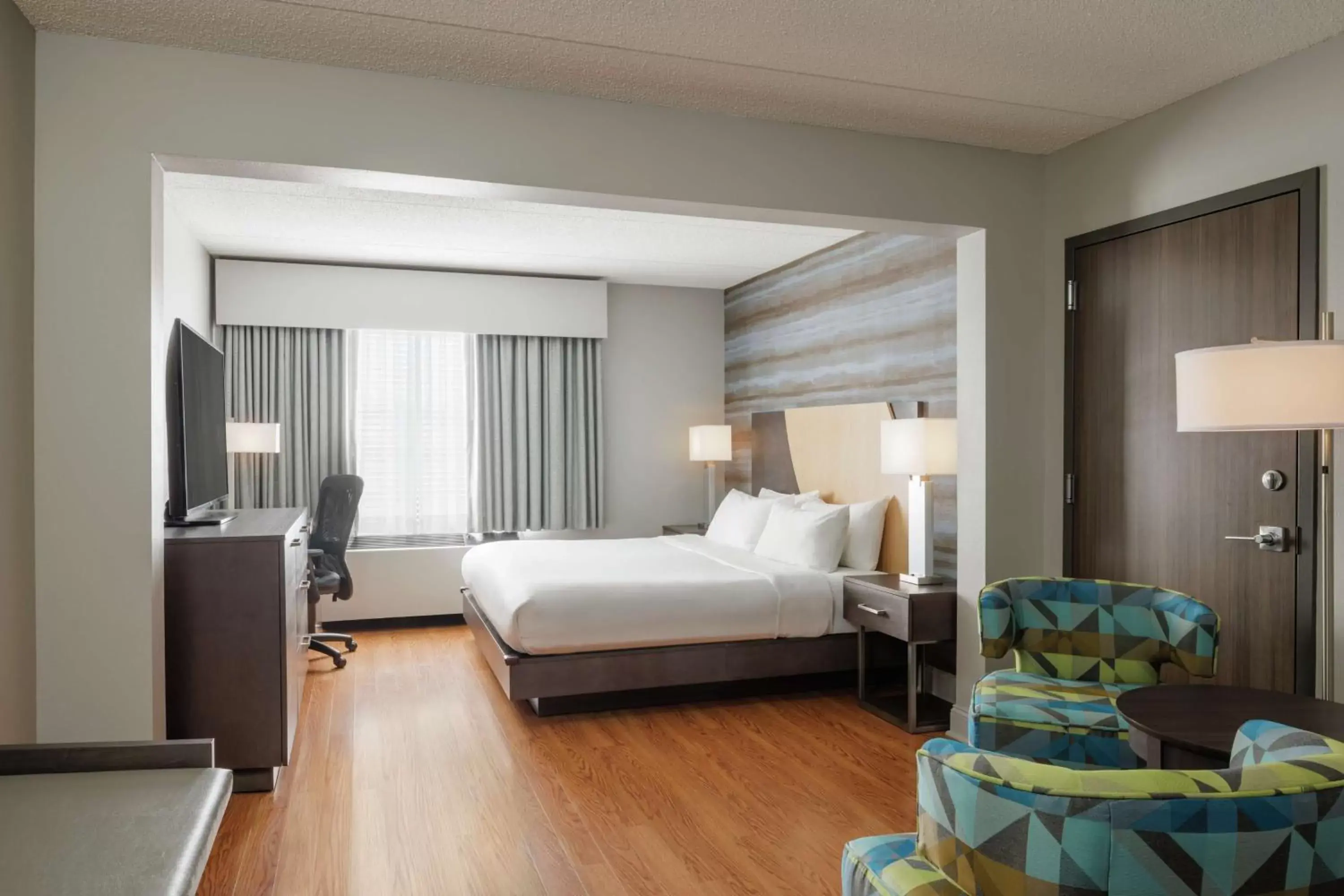 King Room in Hotel Trilogy Albany Airport, Tapestry Collection by Hilton King Room in Hotel Trilogy Albany Airport, Tapestry Collection by Hilton