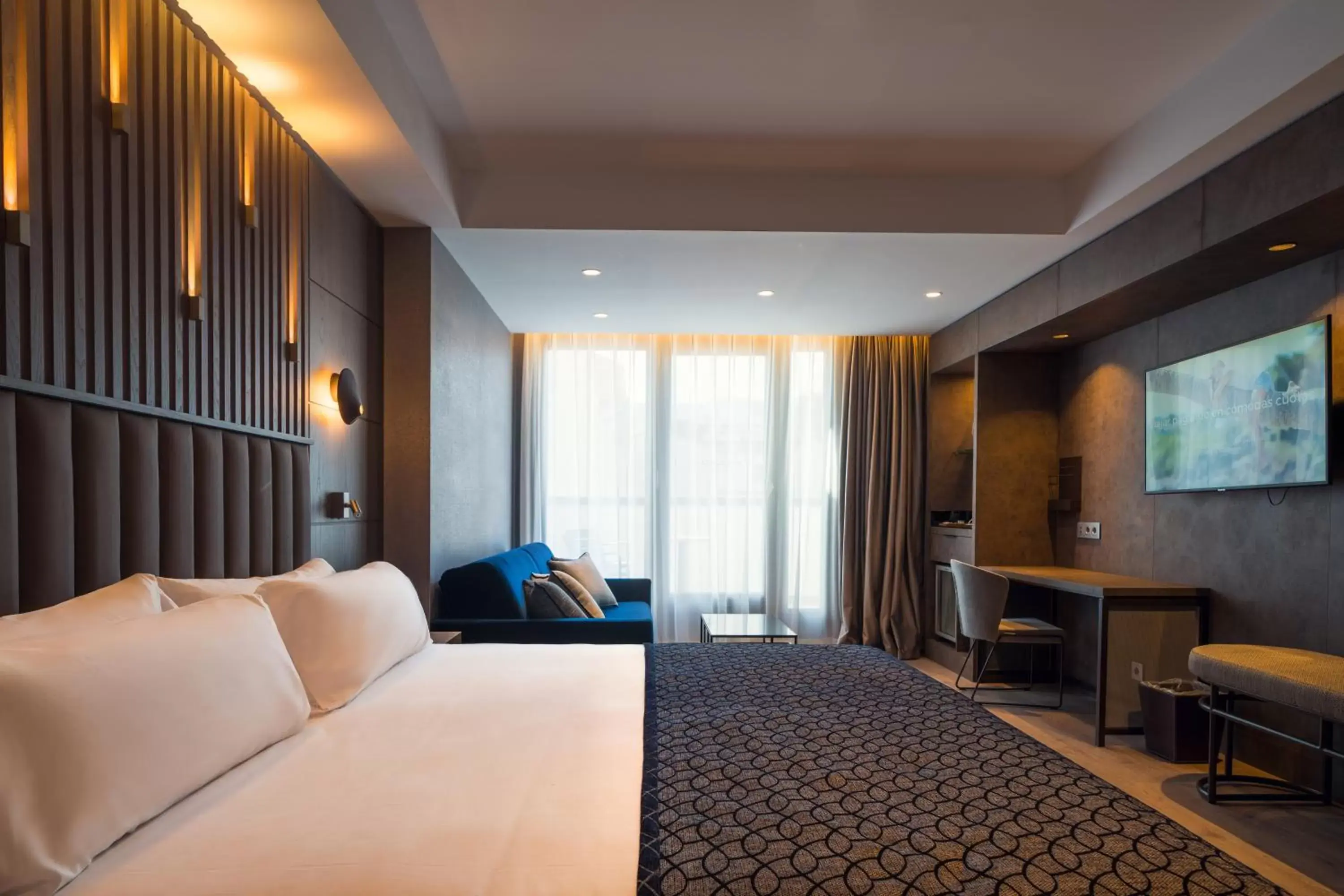 Deluxe Terrace Junior Suite (2 Adults + 1 Child) in Catalonia Gran Vía Bilbao Deluxe Terrace Junior Suite (2 Adults + 1 Child) in Catalonia Gran Vía Bilbao