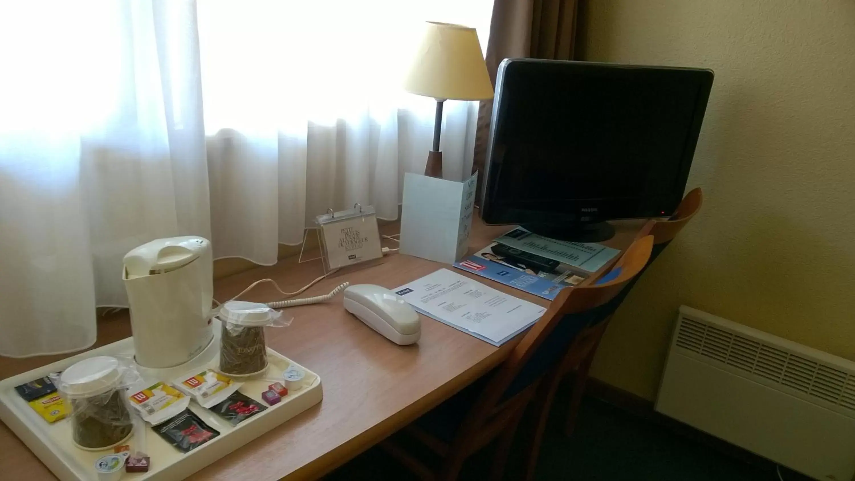 Triple Room (2 Single Beds + 1 Junior Bed) in Kyriad Mulhouse Est - Lutterbach Triple Room (2 Single Beds + 1 Junior Bed) in Kyriad Mulhouse Est - Lutterbach