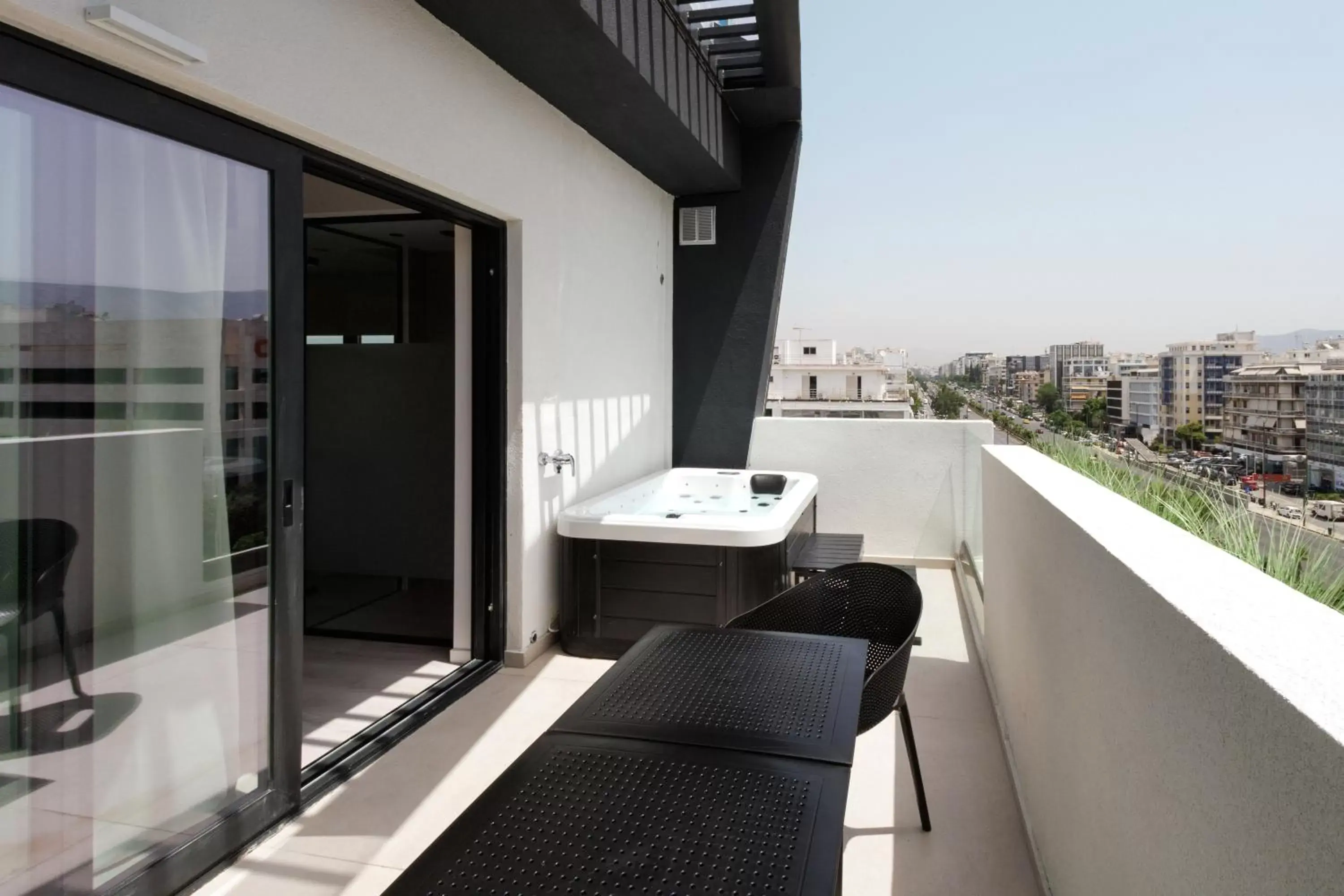 Junior Suite with Outdoor Jacuzzi in LUX&EASY Signature Syngrou 234 Junior Suite with Outdoor Jacuzzi in LUX&EASY Signature Syngrou 234