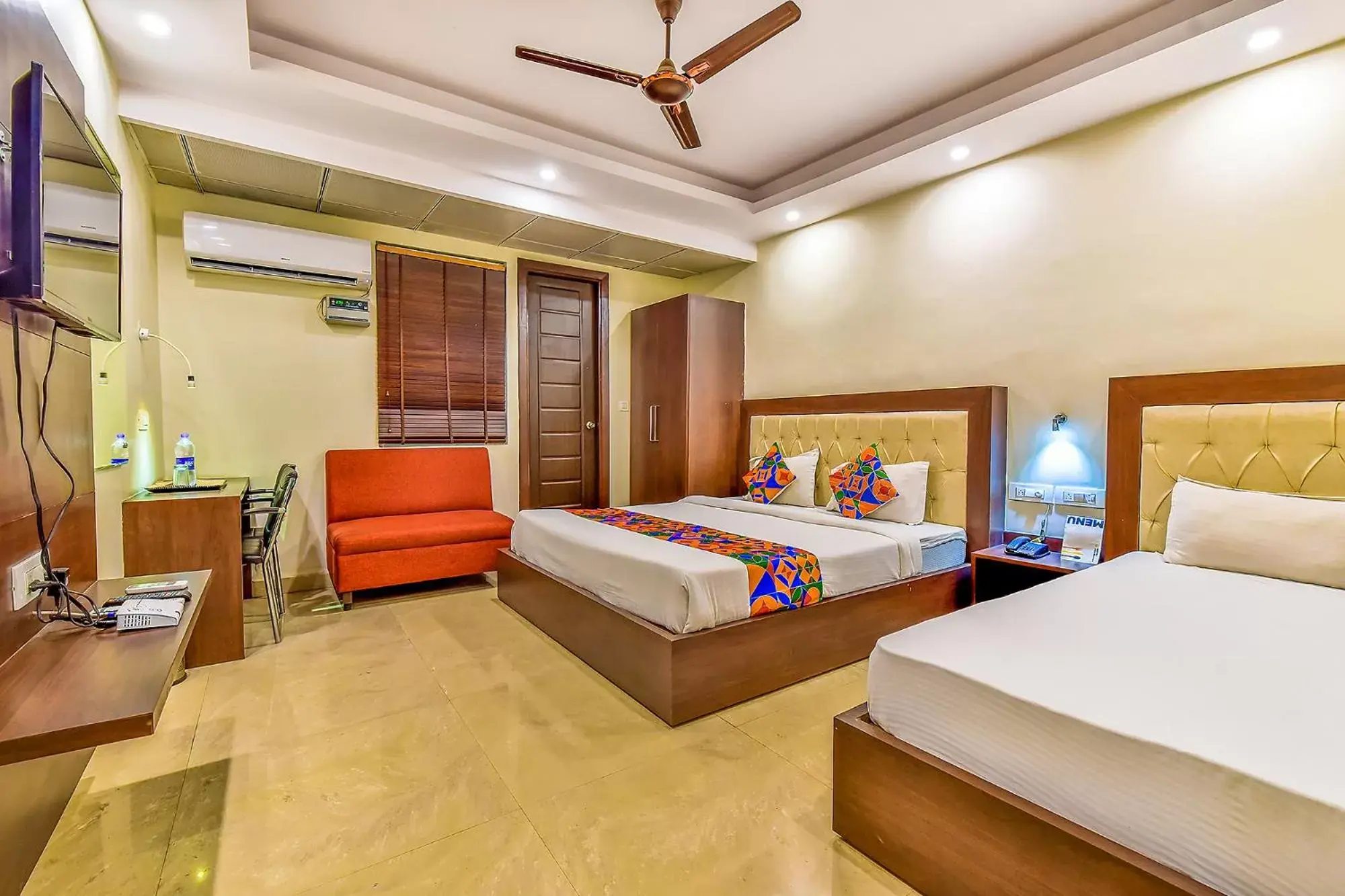 Executive Triple Room in FabHotel Surya Residency GMS Road Executive Triple Room in FabHotel Surya Residency GMS Road