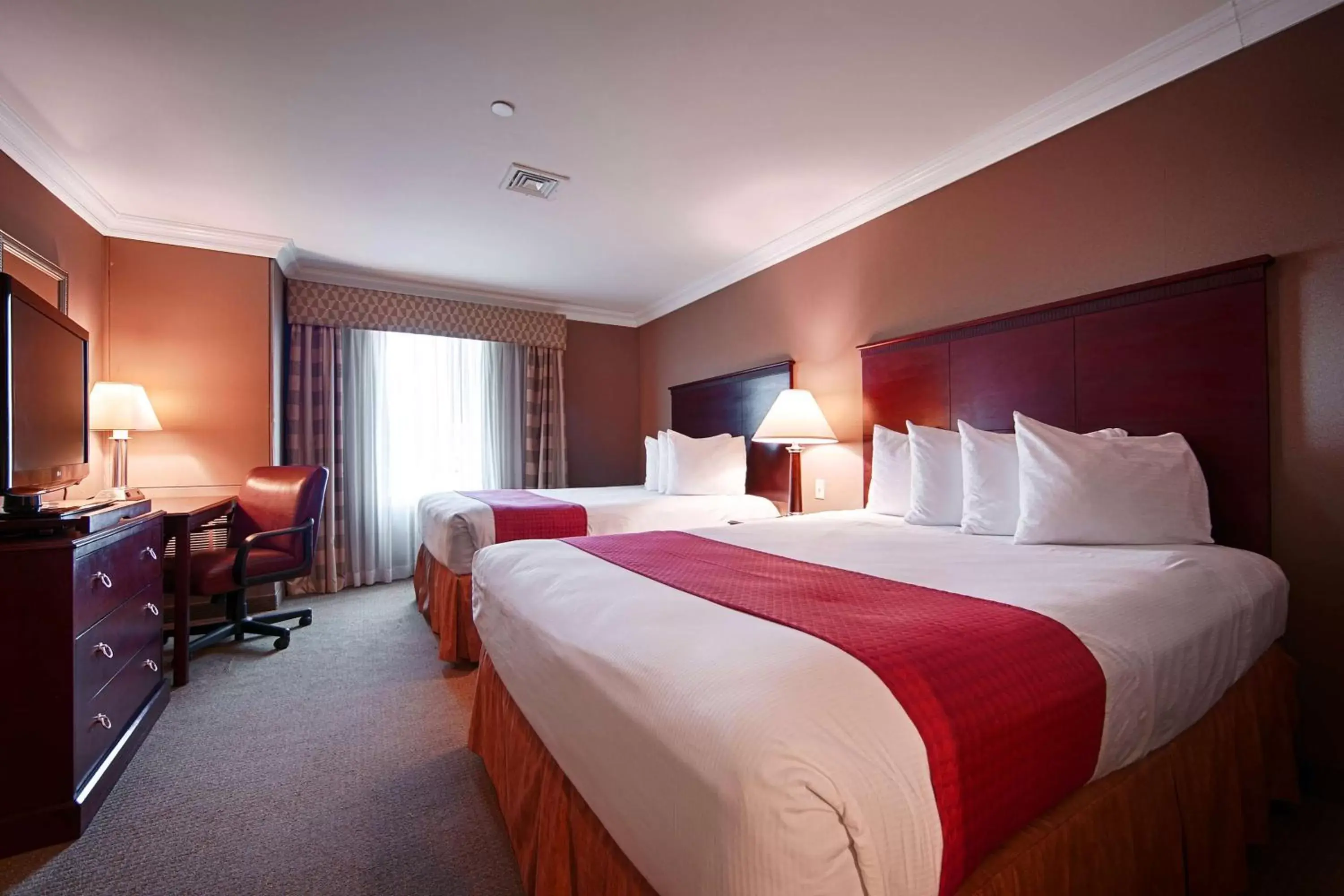 Queen Room with Two Queen Beds in Riverview Inn & Suites Queen Room with Two Queen Beds in Riverview Inn & Suites