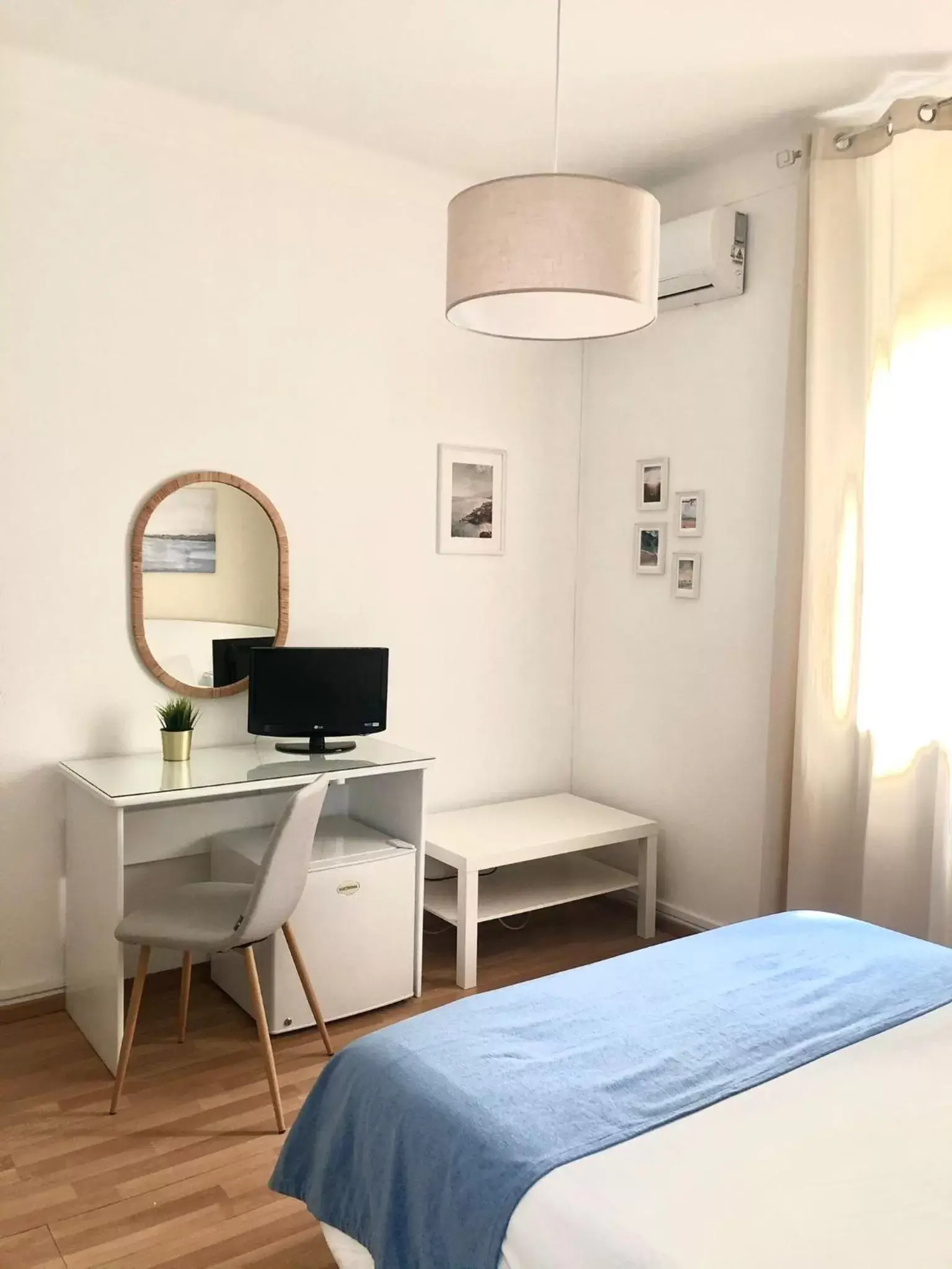 Communal lounge/ TV room, Bed in Arcada House Tavira Communal lounge/ TV room, Bed in Arcada House Tavira