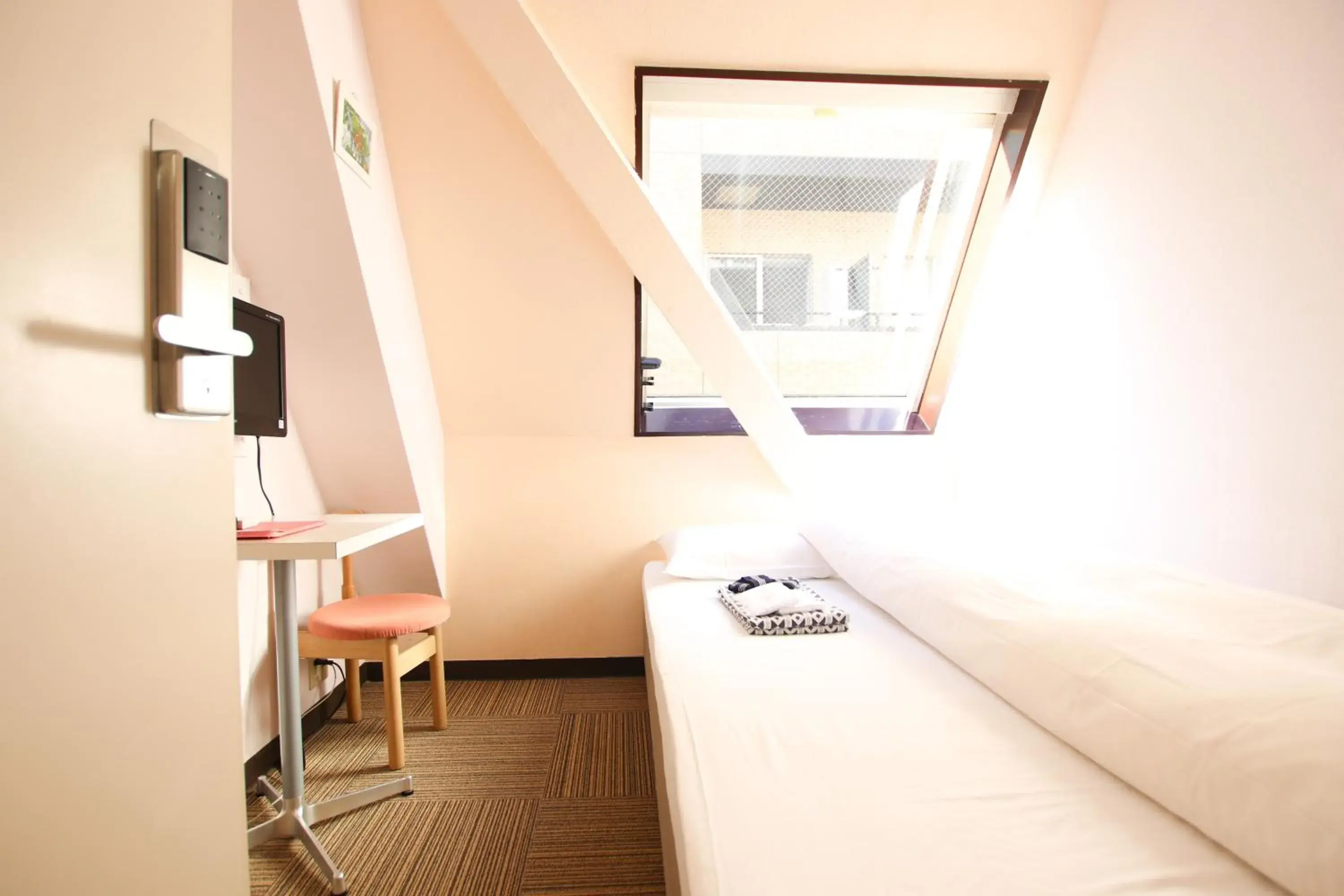 Double Room with Small Double Bed and Shared Bathroom in Sakura Hotel Jimbocho Double Room with Small Double Bed and Shared Bathroom in Sakura Hotel Jimbocho