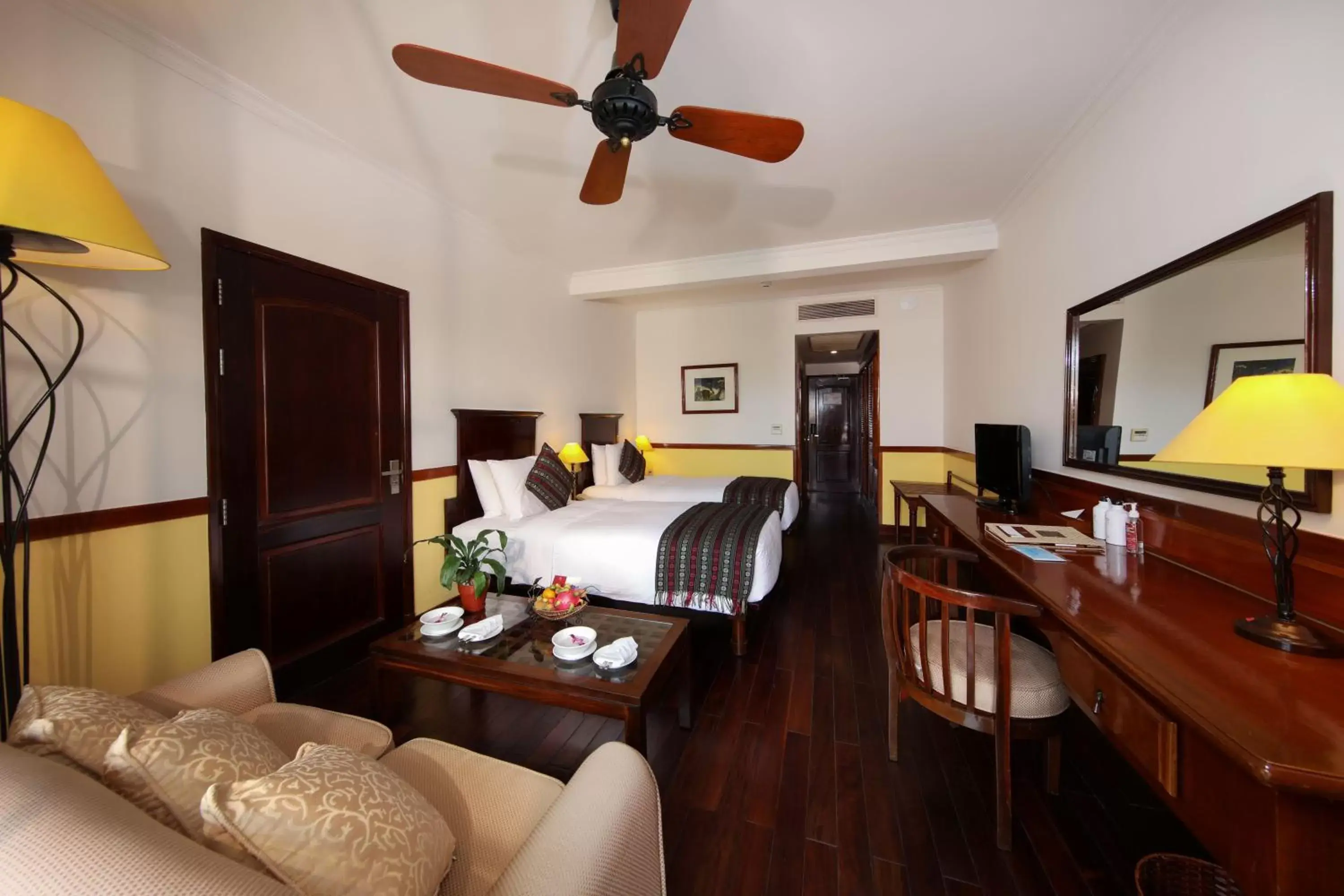 Deluxe Twin Room with Balcony and Pool View in Victoria Can Tho Resort Deluxe Twin Room with Balcony and Pool View in Victoria Can Tho Resort