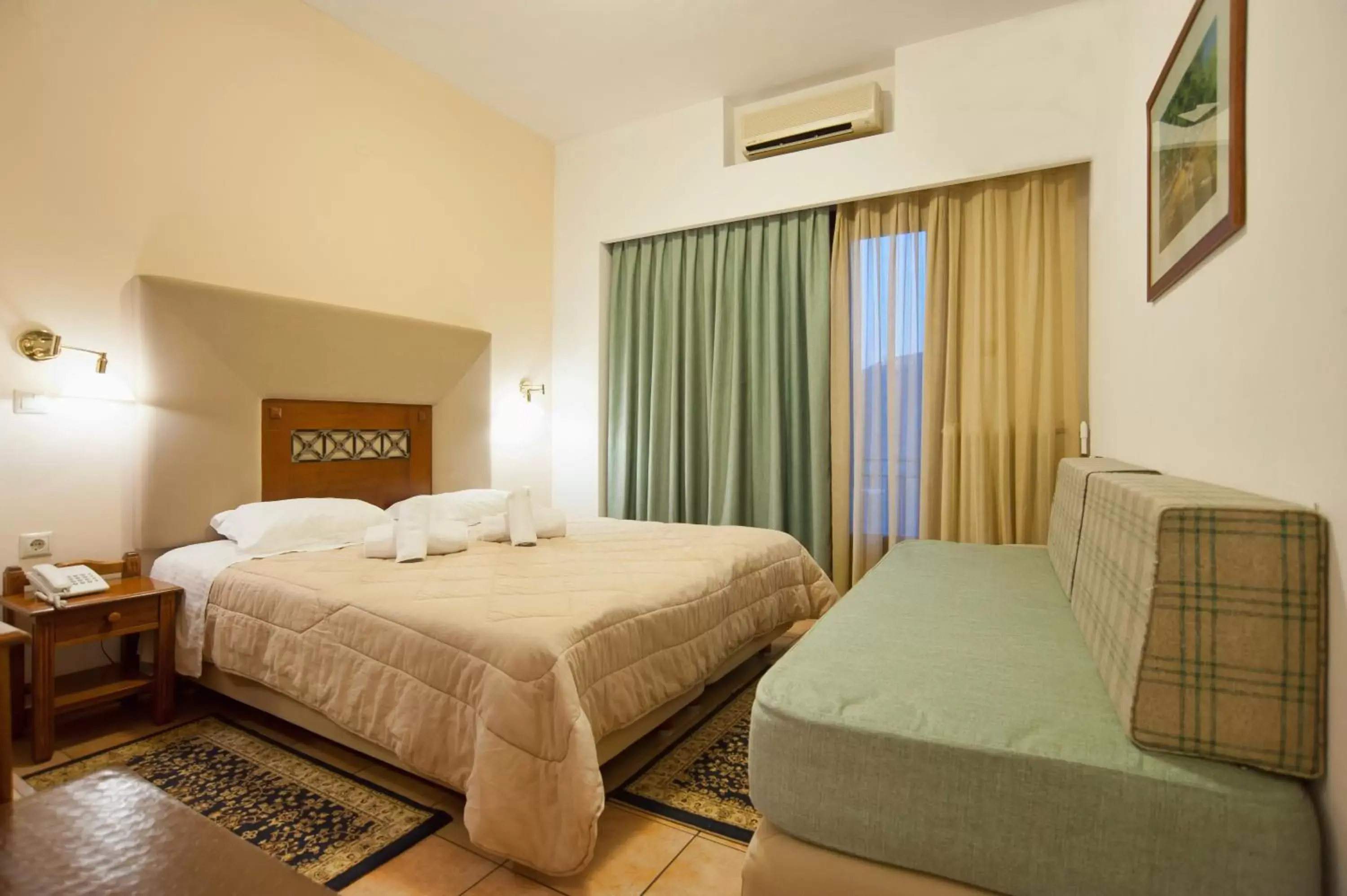 Triple Room in Pan Hotel Triple Room in Pan Hotel