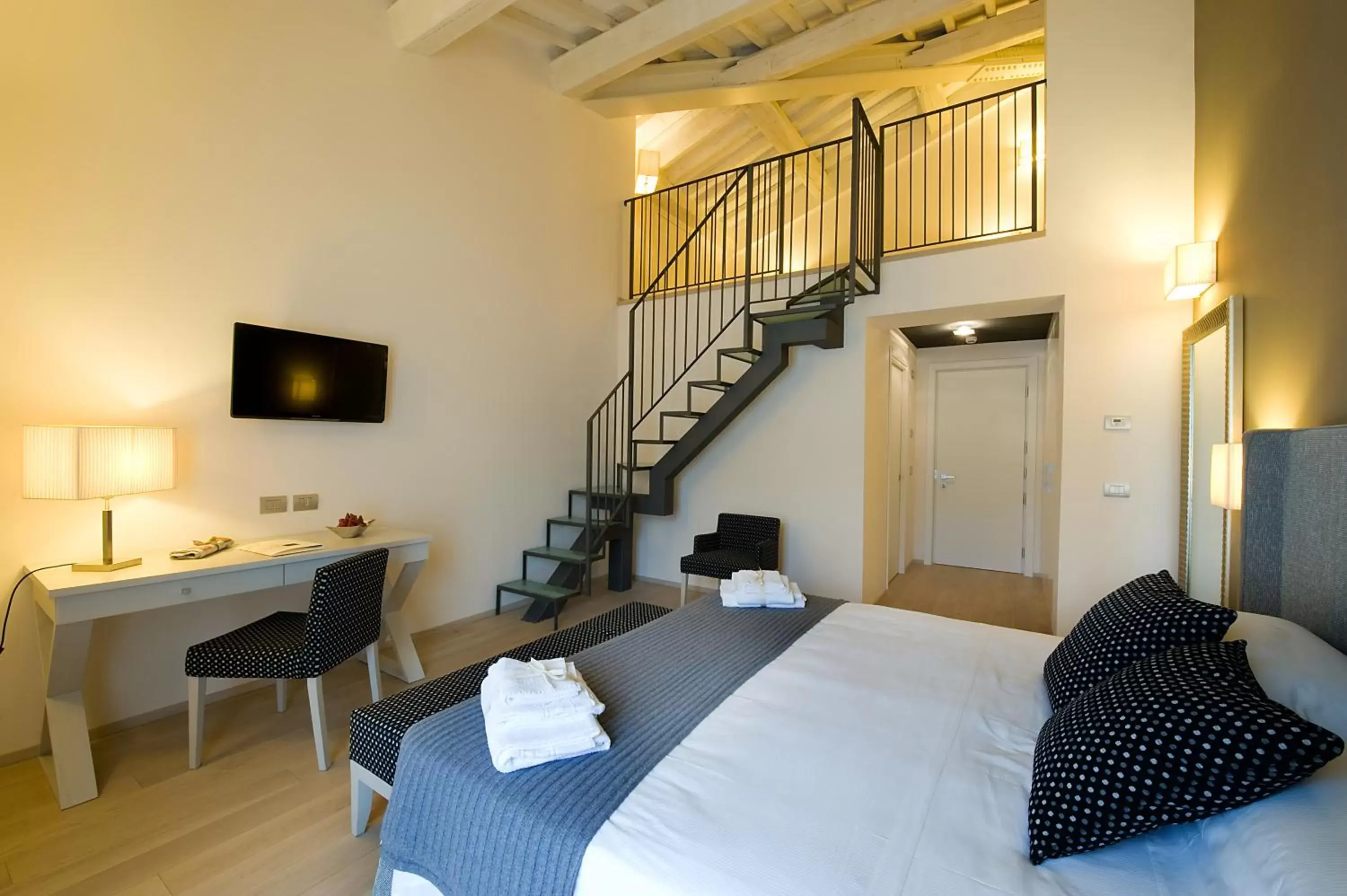 Family Room in Relais dell'Olmo Family Room in Relais dell'Olmo