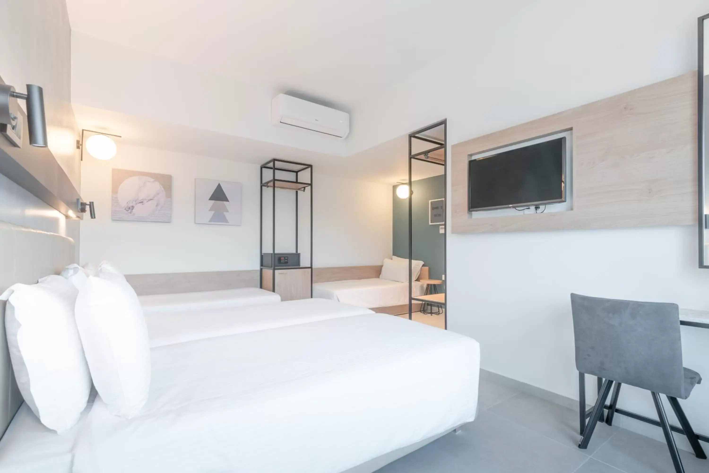 Quadruple Room with Side Sea View in Hotel Avra by Smile hotels - Free Airport Shuttle Quadruple Room with Side Sea View in Hotel Avra by Smile hotels - Free Airport Shuttle