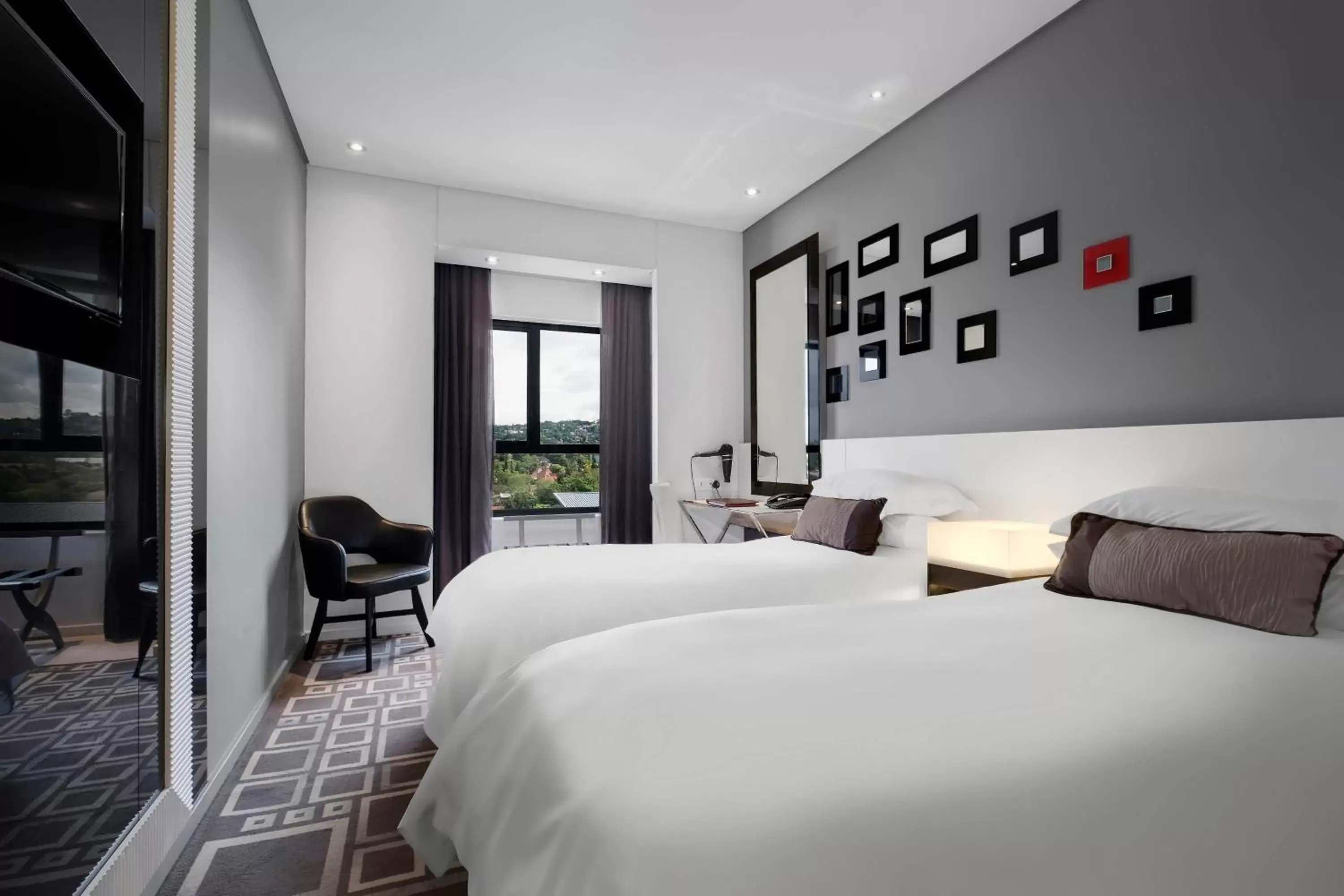 Twin Room in Protea Hotel Fire & Ice! by Marriott Pretoria Menlyn Twin Room in Protea Hotel Fire & Ice! by Marriott Pretoria Menlyn