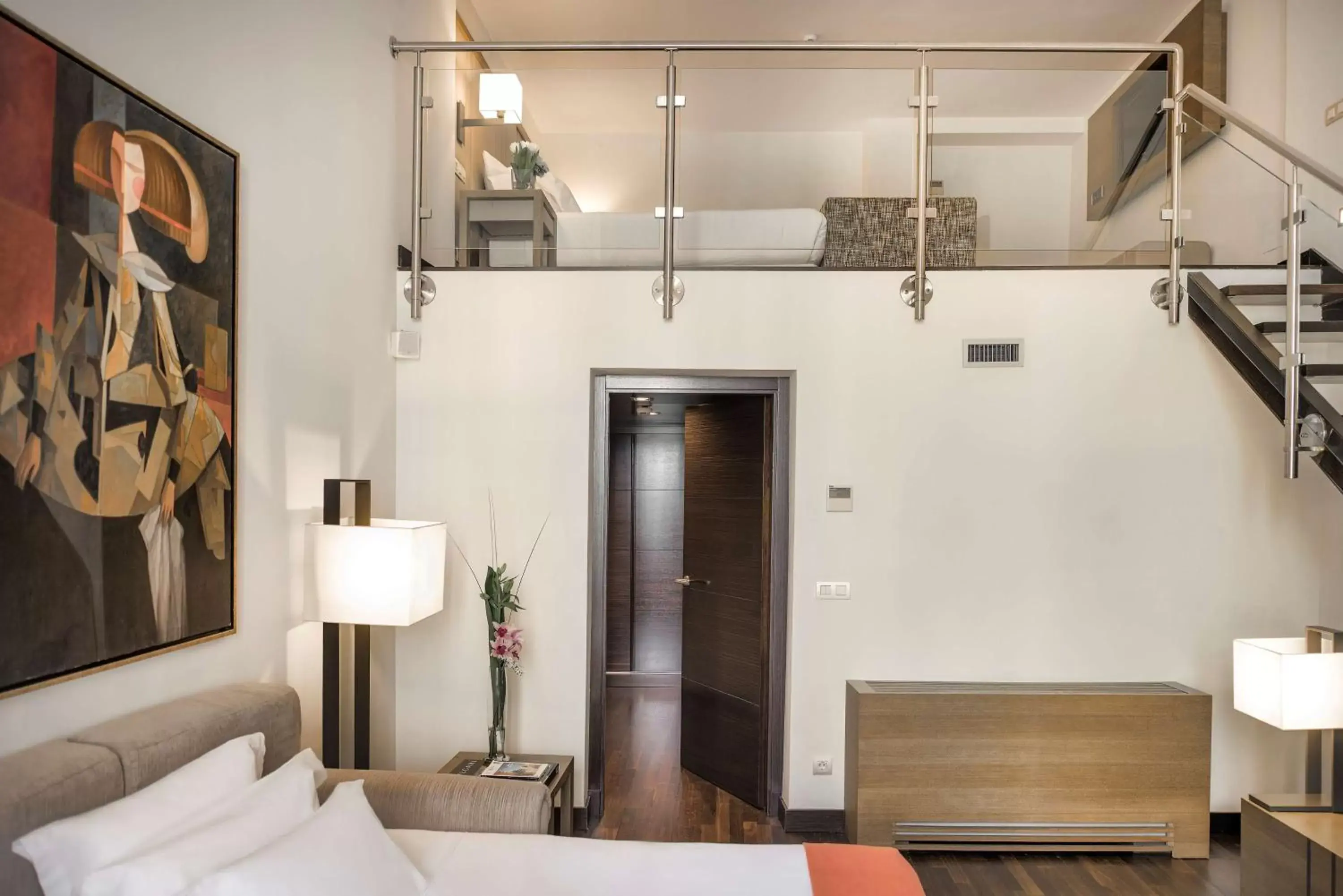 Junior Suite with sofa in NH Collection Madrid Palacio de Tepa Junior Suite with sofa in NH Collection Madrid Palacio de Tepa