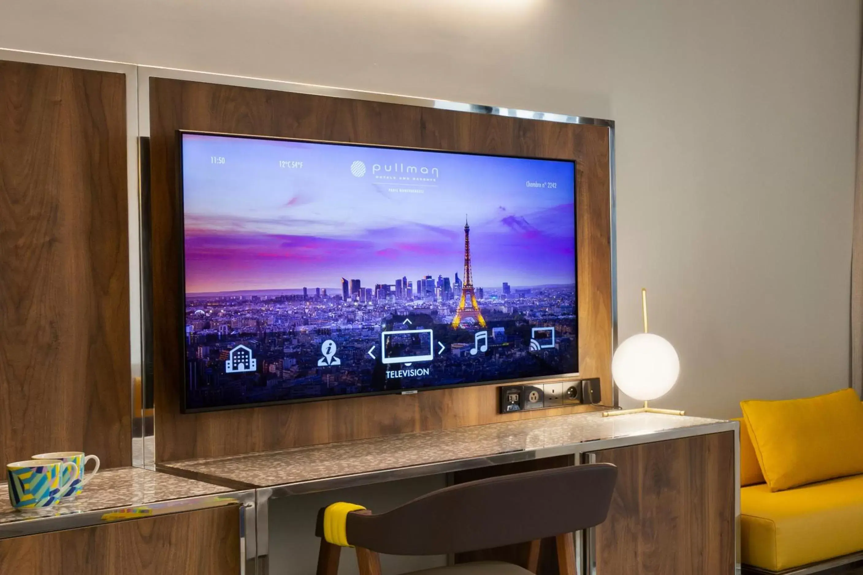 Deluxe Suite with one King Size Bed and one Sofa with City View in Pullman Paris Montparnasse Deluxe Suite with one King Size Bed and one Sofa with City View in Pullman Paris Montparnasse