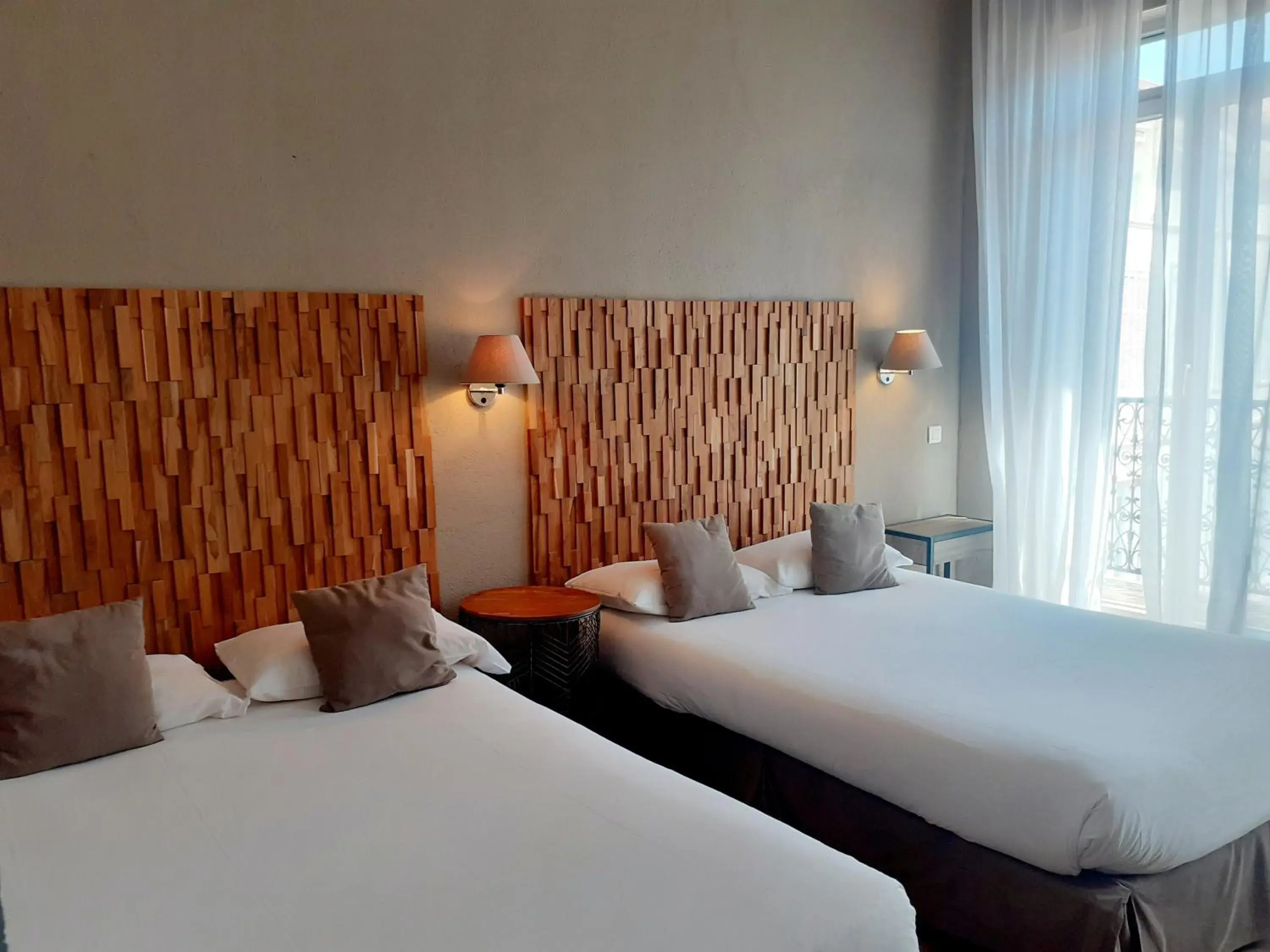 Quadruple Room with Balcony in Hôtel La Villa Tosca Quadruple Room with Balcony in Hôtel La Villa Tosca