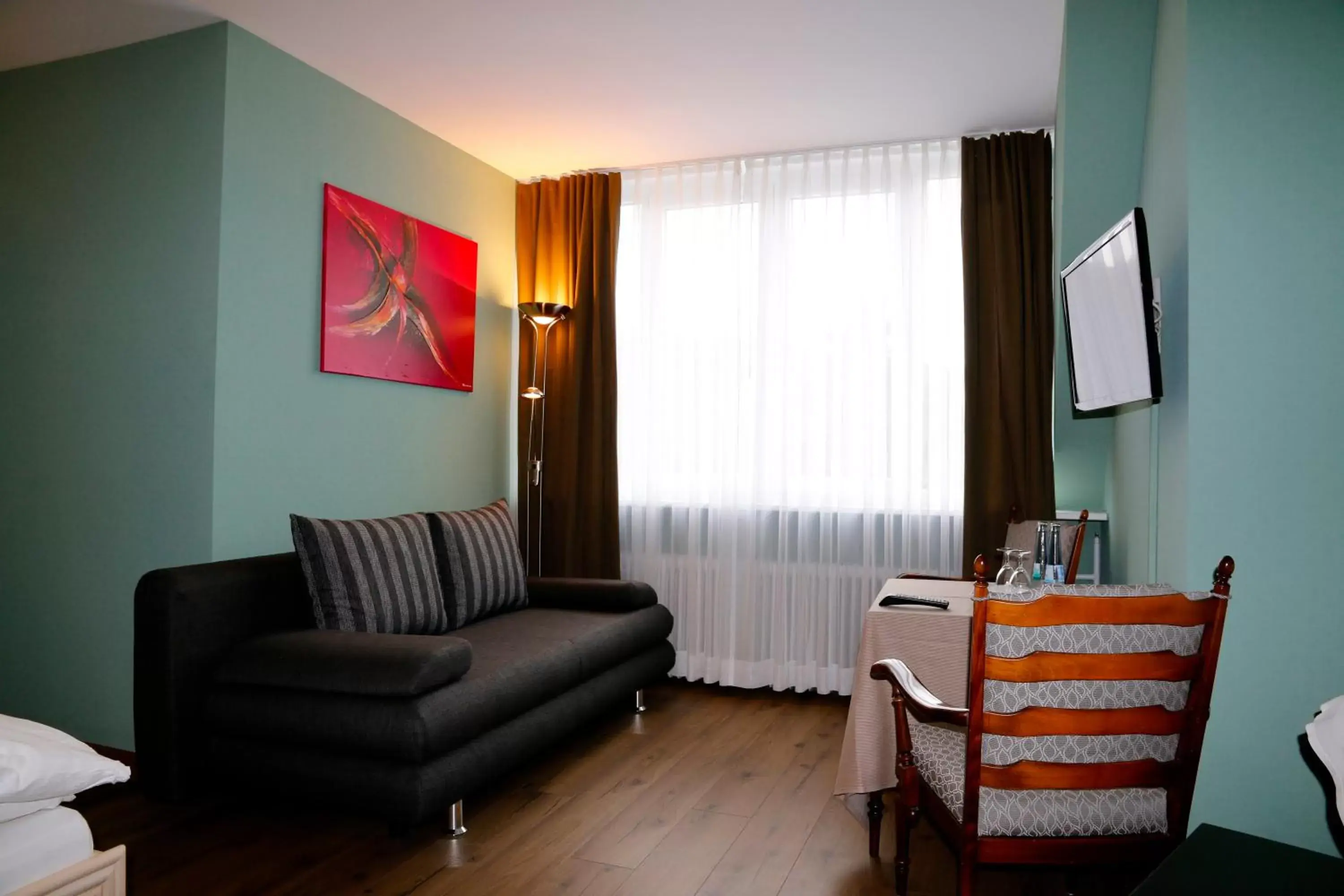 Quadruple Room in Hotel Markgräfler Hof Quadruple Room in Hotel Markgräfler Hof