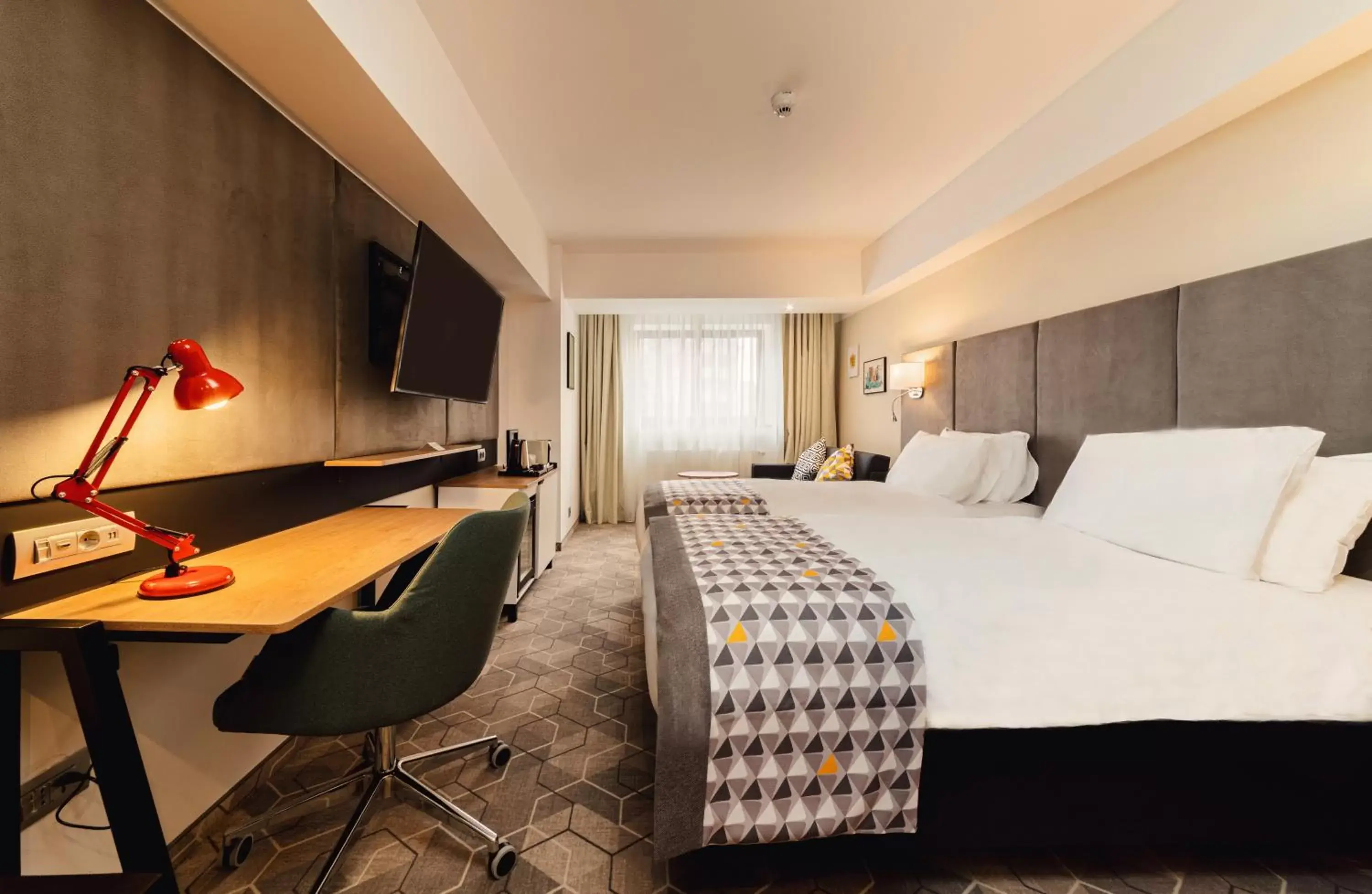Premium Twin Room with Sofa Bed and City View in Holiday Inn Bucharest - Times by IHG Premium Twin Room with Sofa Bed and City View in Holiday Inn Bucharest - Times by IHG