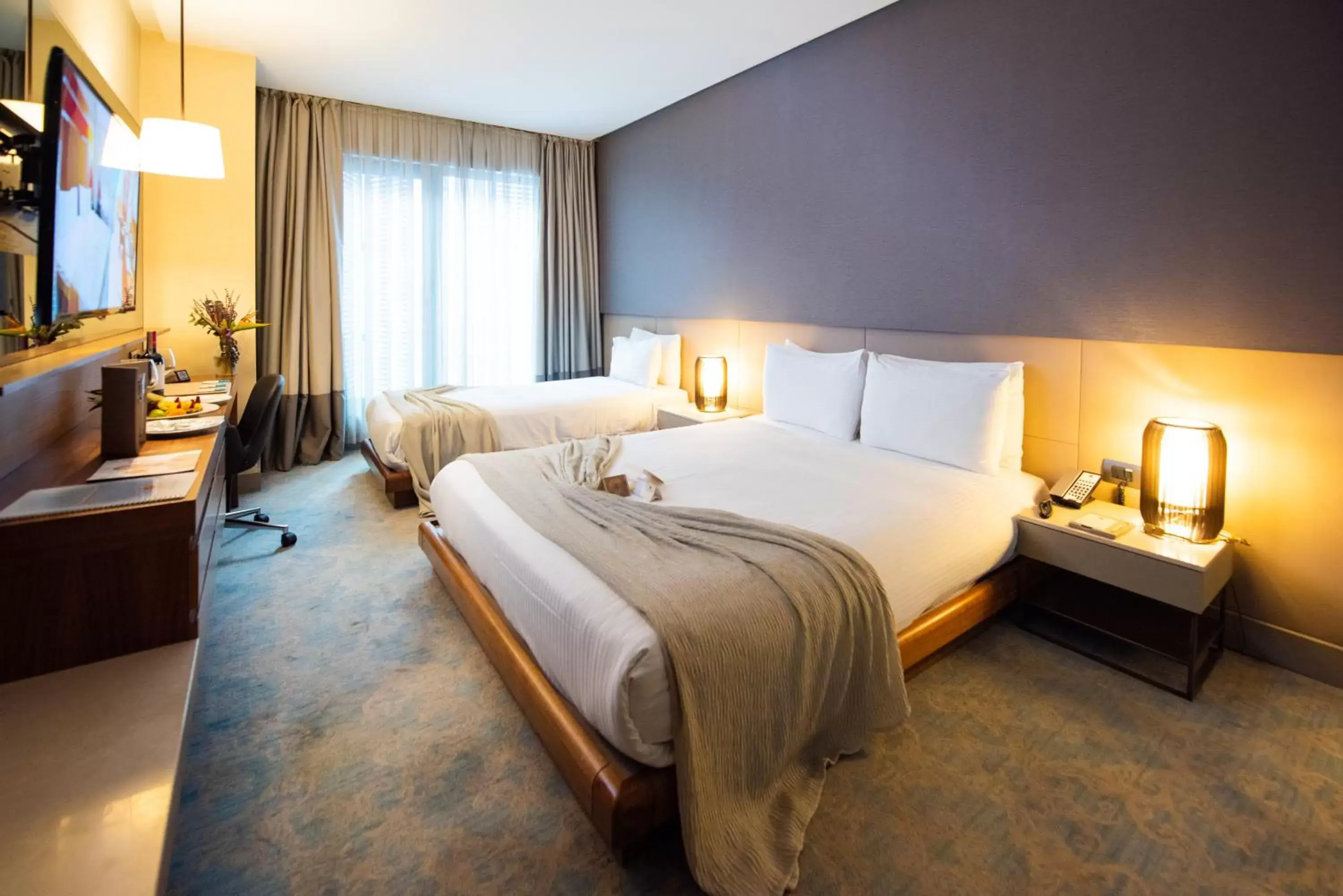 Standard Triple Room in Dosso Dossi Hotels & SPA Downtown Standard Triple Room in Dosso Dossi Hotels & SPA Downtown