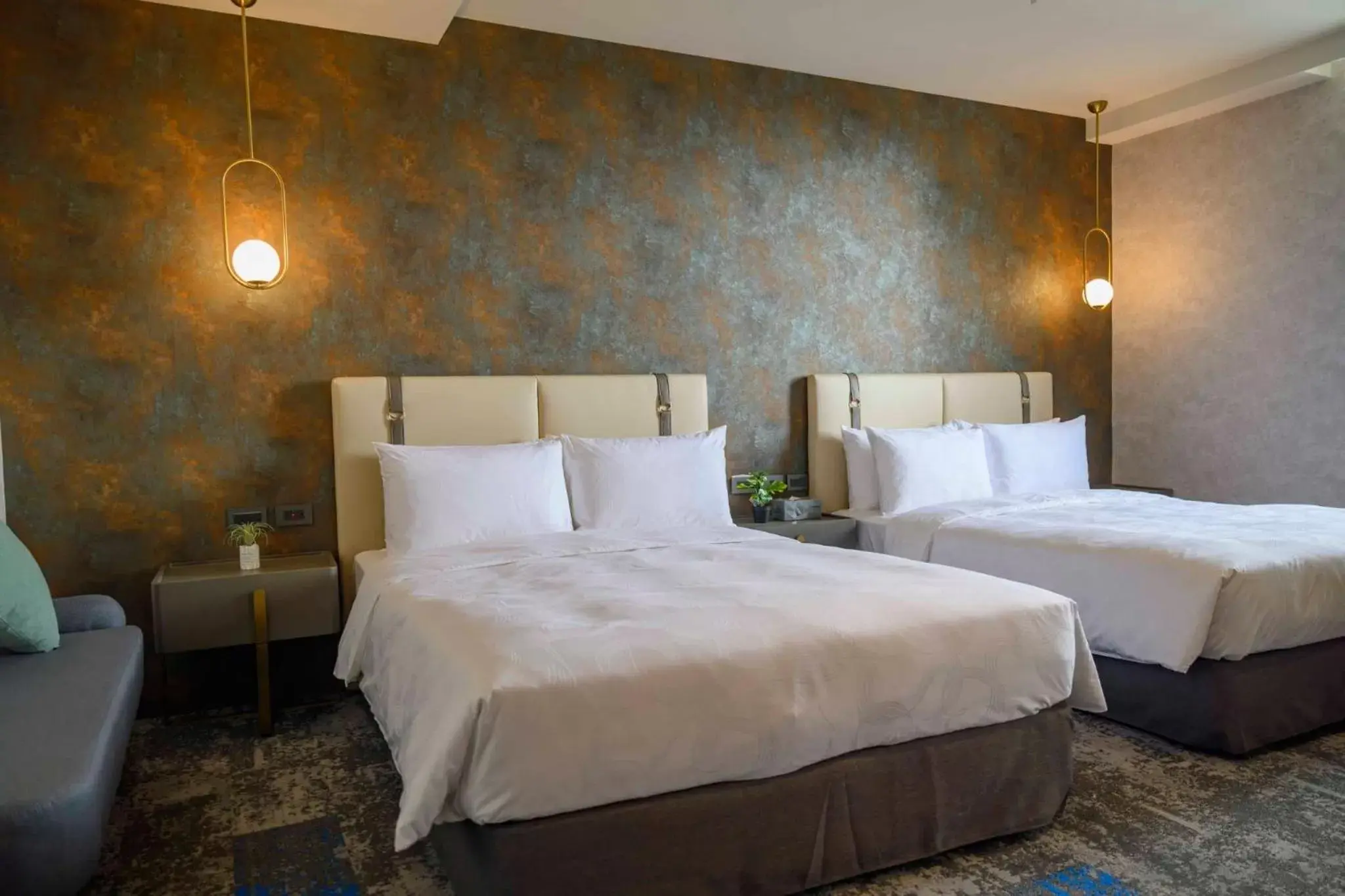 Standard Quadruple Room in Tenz Go Hotel Standard Quadruple Room in Tenz Go Hotel