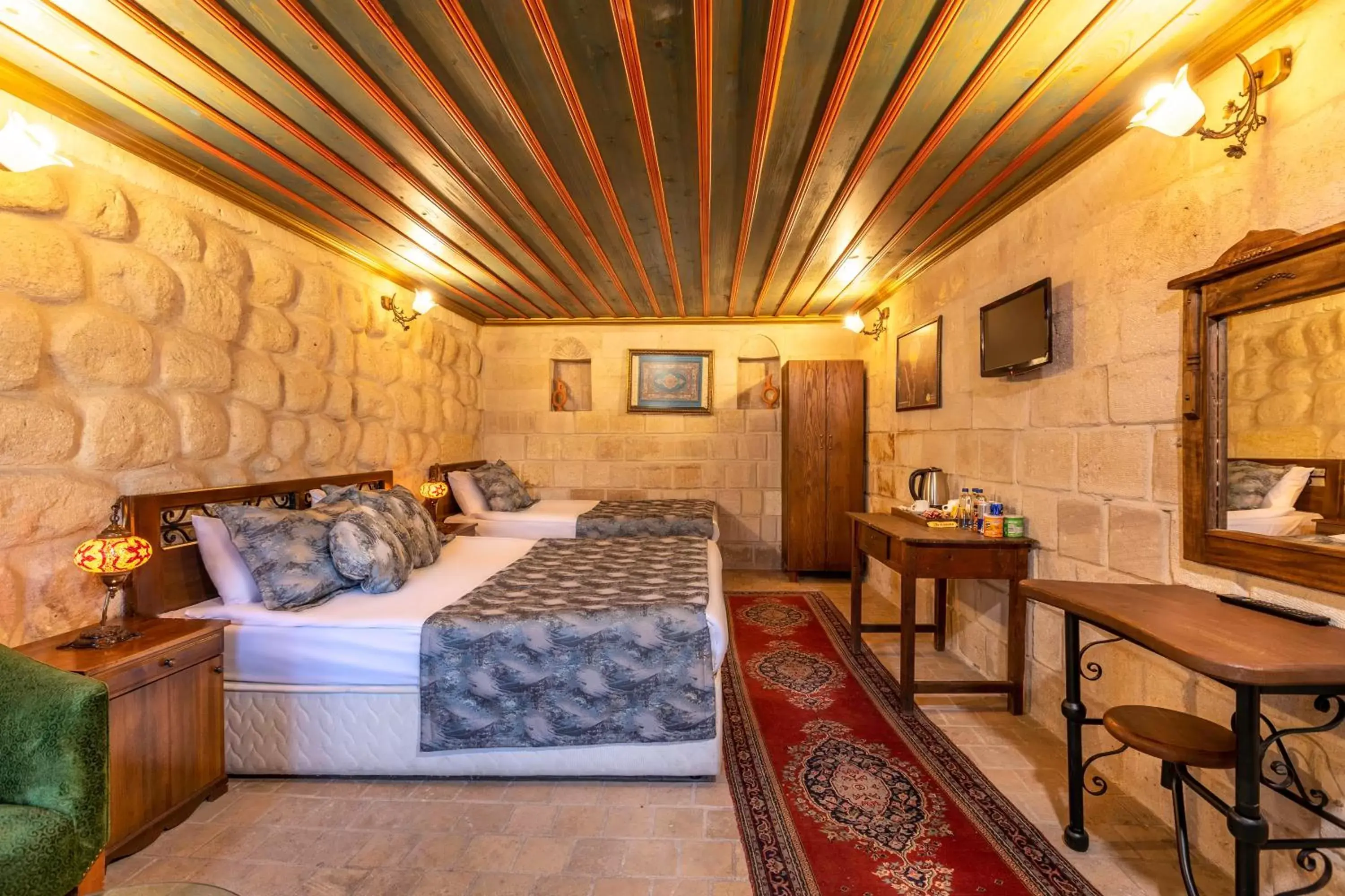 Deluxe Triple Room in Adora Cave Suites - Deluxe Triple Room in Adora Cave Suites -