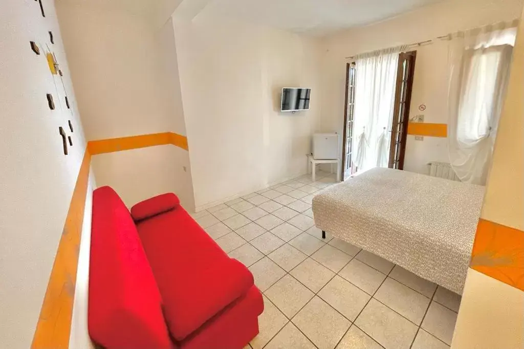 Triple Room - Disability Access in Albergo Vittoria Triple Room - Disability Access in Albergo Vittoria
