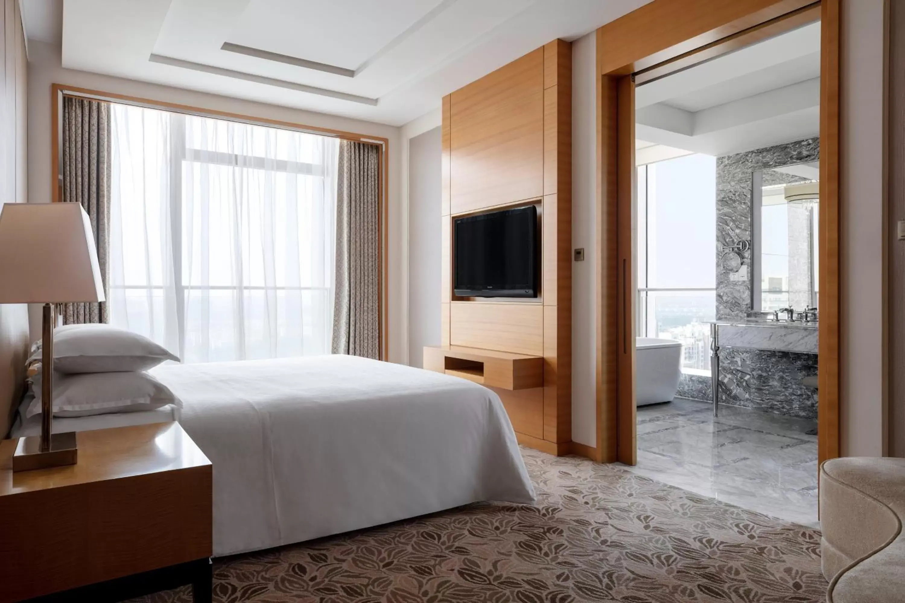 Deluxe King Suite in Sheraton Qingdao Jiaozhou Hotel Deluxe King Suite in Sheraton Qingdao Jiaozhou Hotel