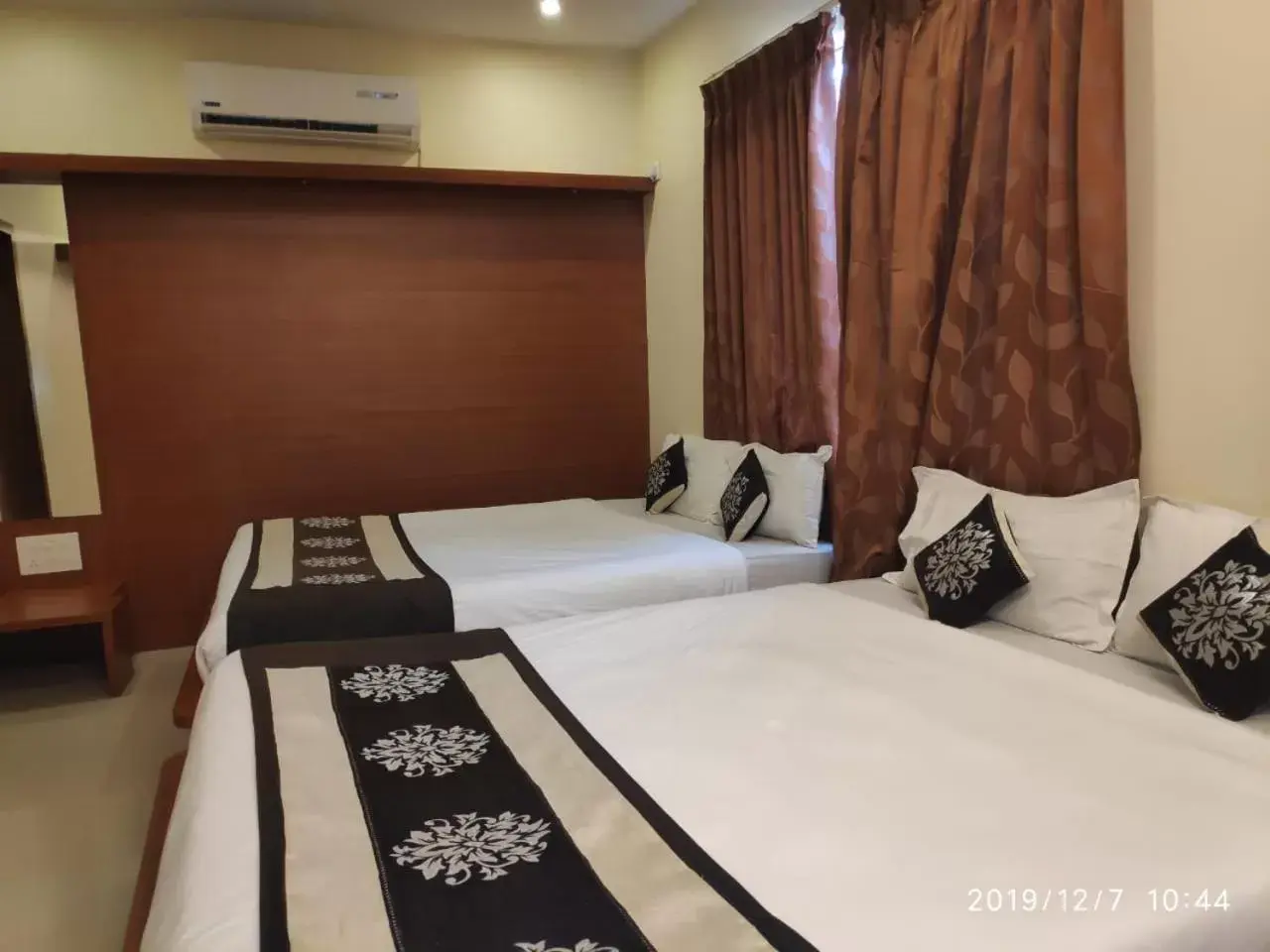 Quadruple Room in The Grand Inn Mysore Quadruple Room in The Grand Inn Mysore