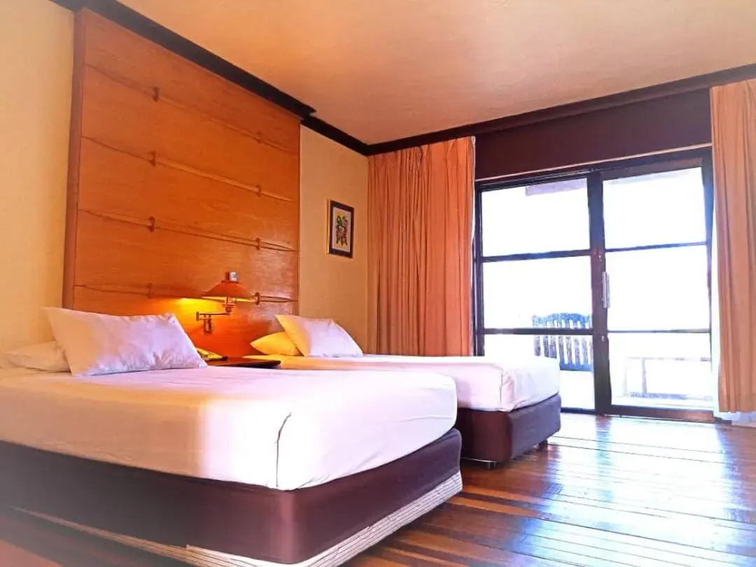 Deluxe Twin Room with Garden View in Sutra Beach Resort, Terengganu Deluxe Twin Room with Garden View in Sutra Beach Resort, Terengganu