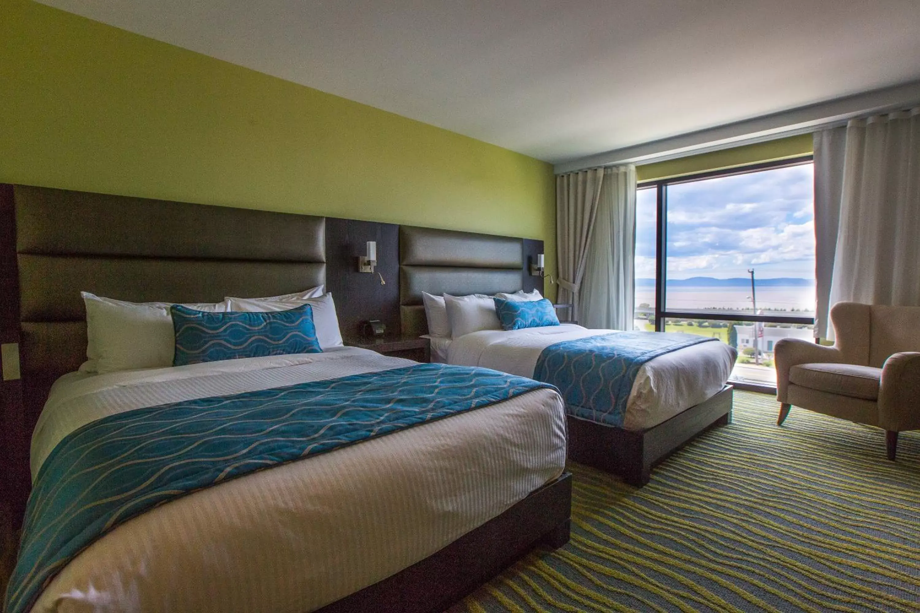 Queen Room with Two Queen Beds with River View - Non-smoking in Hotel Levesque Queen Room with Two Queen Beds with River View - Non-smoking in Hotel Levesque