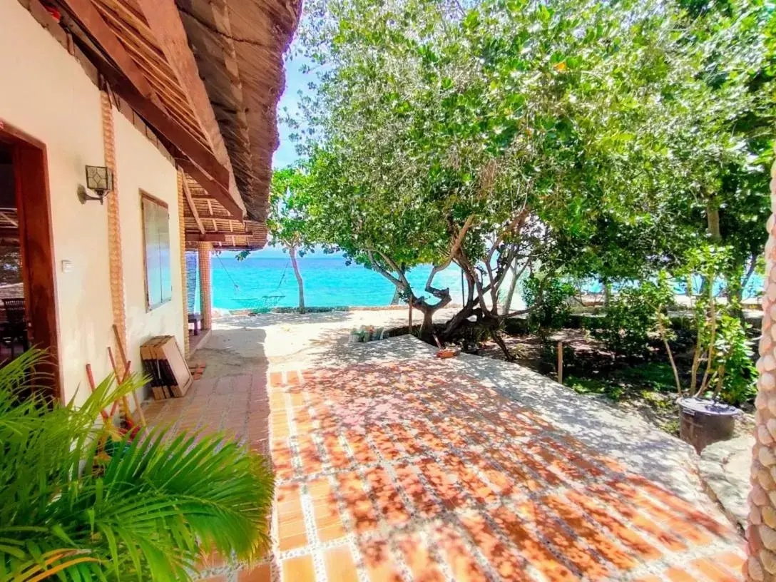 Deluxe Double Room with Side Sea View in Moalboal T Breeze Coastal Resort Deluxe Double Room with Side Sea View in Moalboal T Breeze Coastal Resort