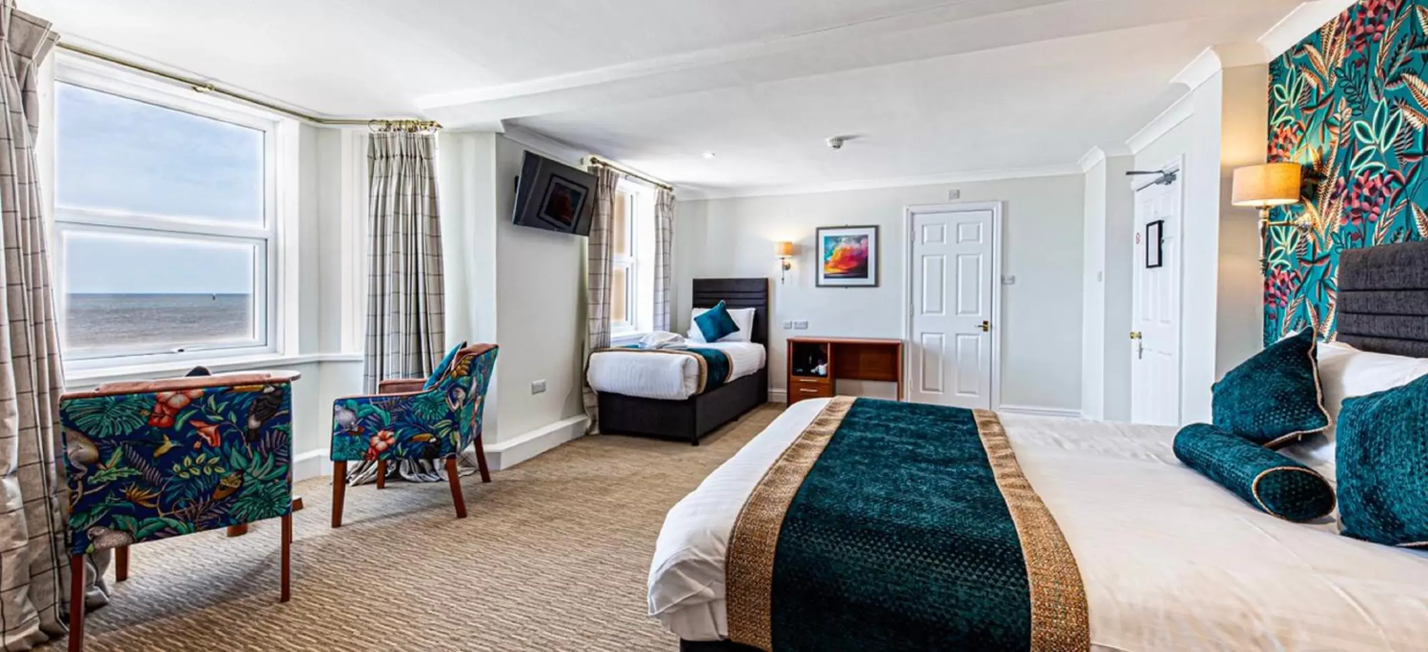 Triple Room with Coastal View in The Beaches Hotel and Spa Triple Room with Coastal View in The Beaches Hotel and Spa