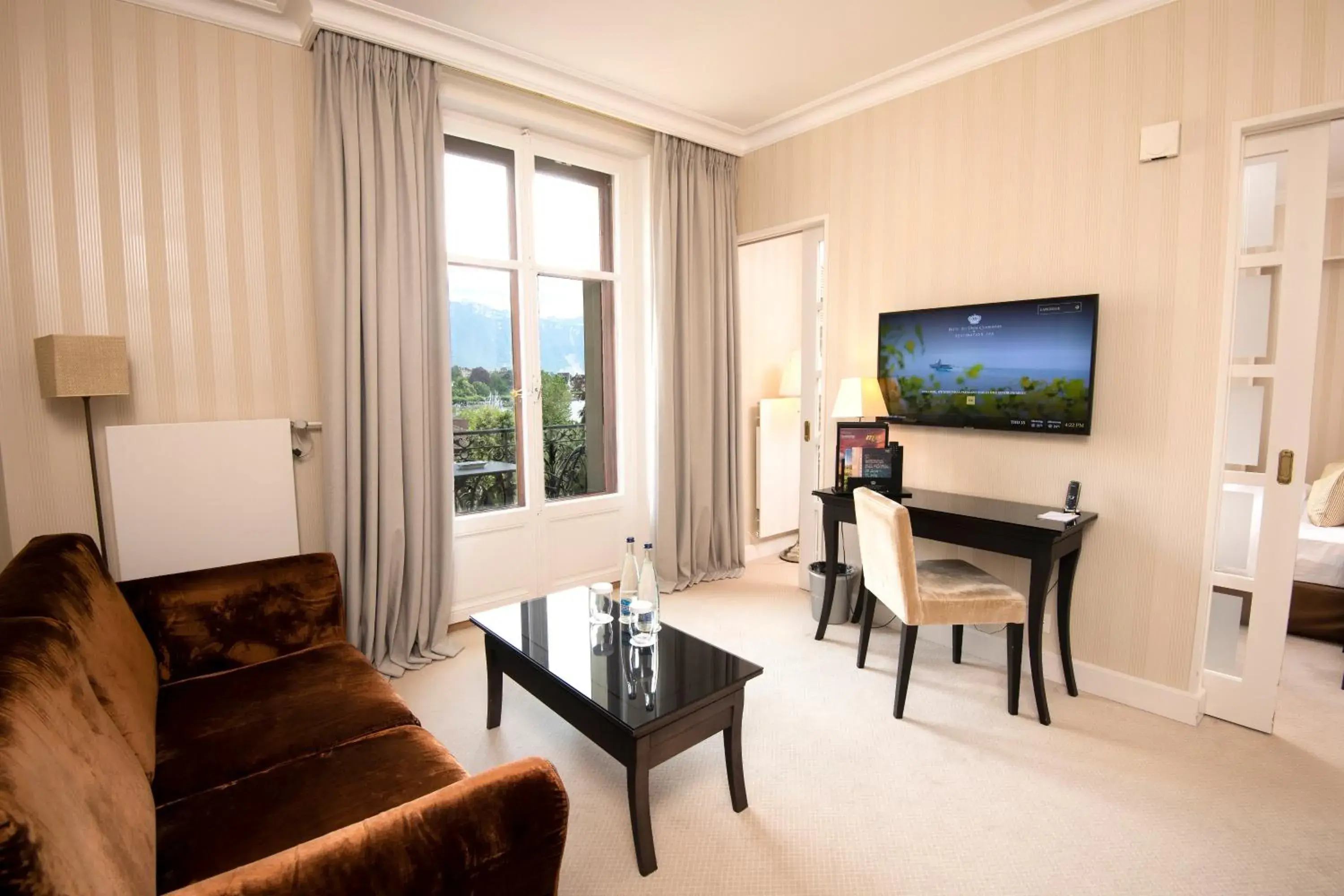 Executive Suite with Partial Lake View in Hôtel Des Trois Couronnes & Spa - The Leading Hotels of the World Executive Suite with Partial Lake View in Hôtel Des Trois Couronnes & Spa - The Leading Hotels of the World