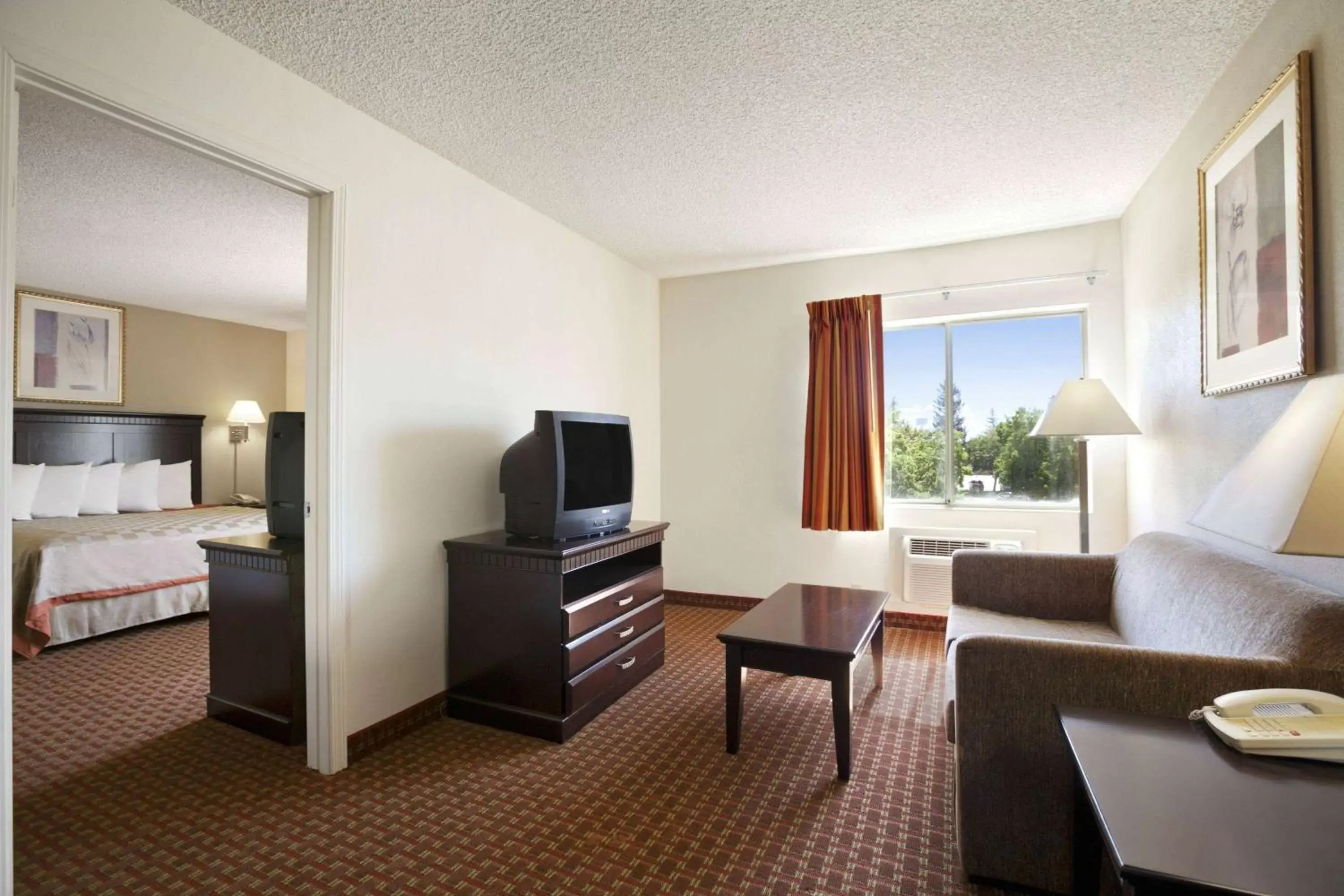 Two-Room King Suite - Non Smoking in Days Inn & Suites by Wyndham Rancho Cordova Two-Room King Suite - Non Smoking in Days Inn & Suites by Wyndham Rancho Cordova
