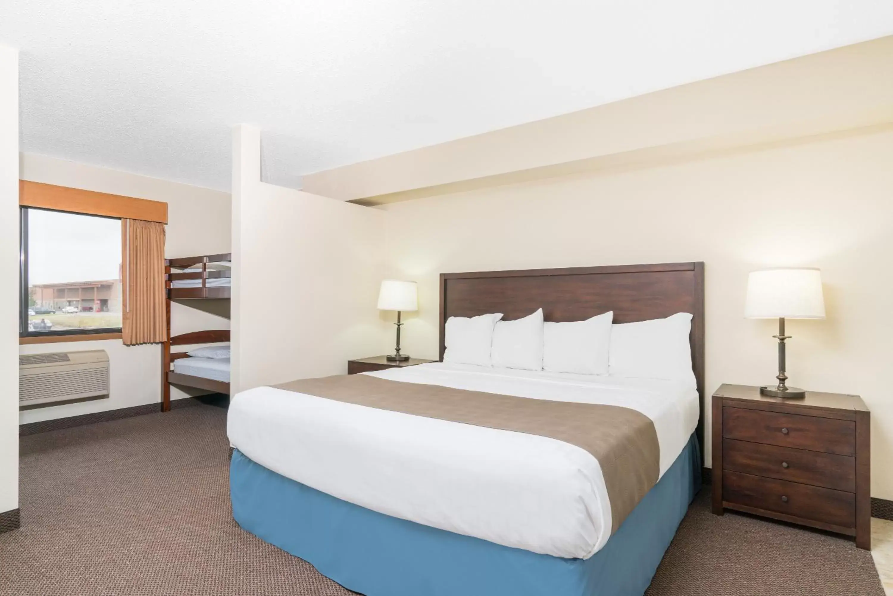 Two-Bedroom Suite with One King and One Double Bed with Sofa Bed - Non-Smoking in Days Inn & Suites by Wyndham Baxter Brainerd Area Two-Bedroom Suite with One King and One Double Bed with Sofa Bed - Non-Smoking in Days Inn & Suites by Wyndham Baxter Brainerd Area