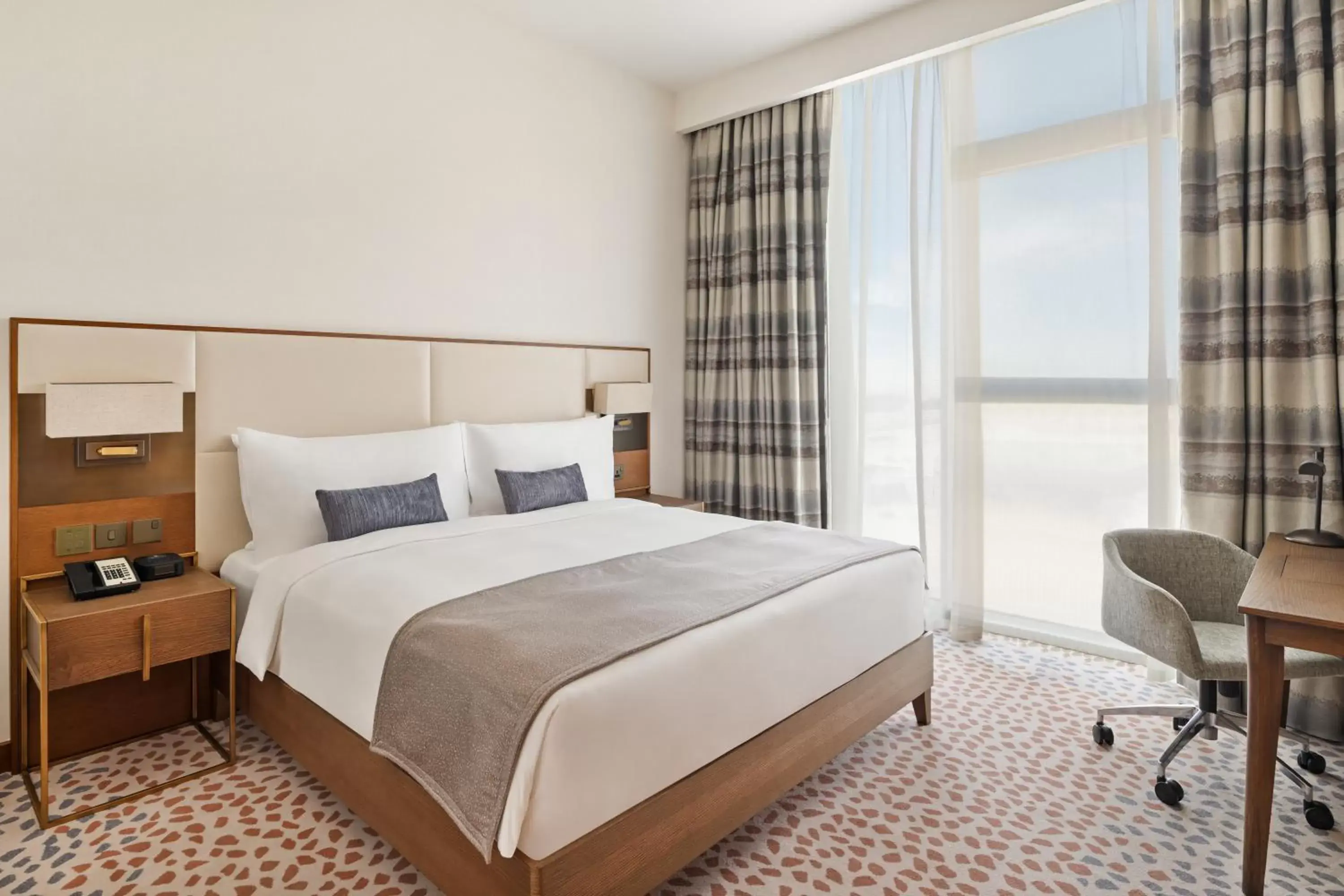 One-Bedroom King Suite with Pool View in Staybridge Suites Dubai Al-Maktoum Airport by IHG One-Bedroom King Suite with Pool View in Staybridge Suites Dubai Al-Maktoum Airport by IHG