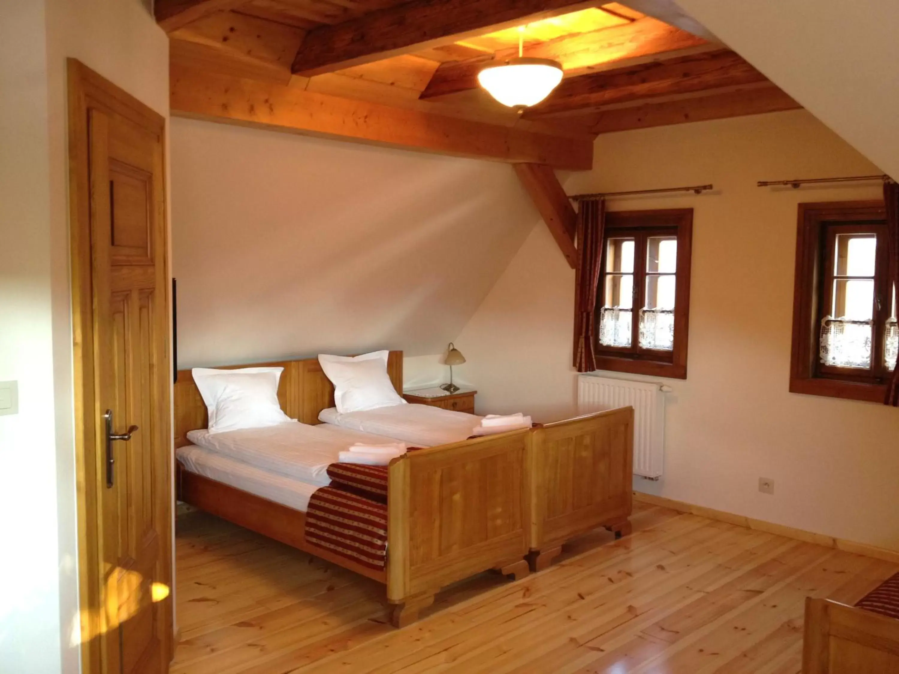 Comfort Triple Room in Pensjonat Dom Zegarmistrza Comfort Triple Room in Pensjonat Dom Zegarmistrza