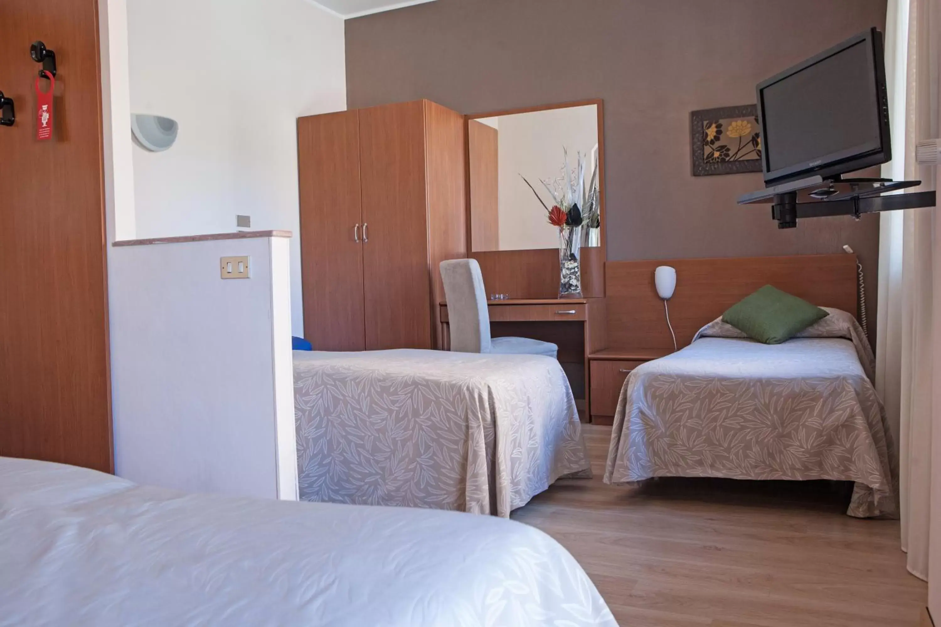 Quadruple Room in Hotel Adriano Quadruple Room in Hotel Adriano