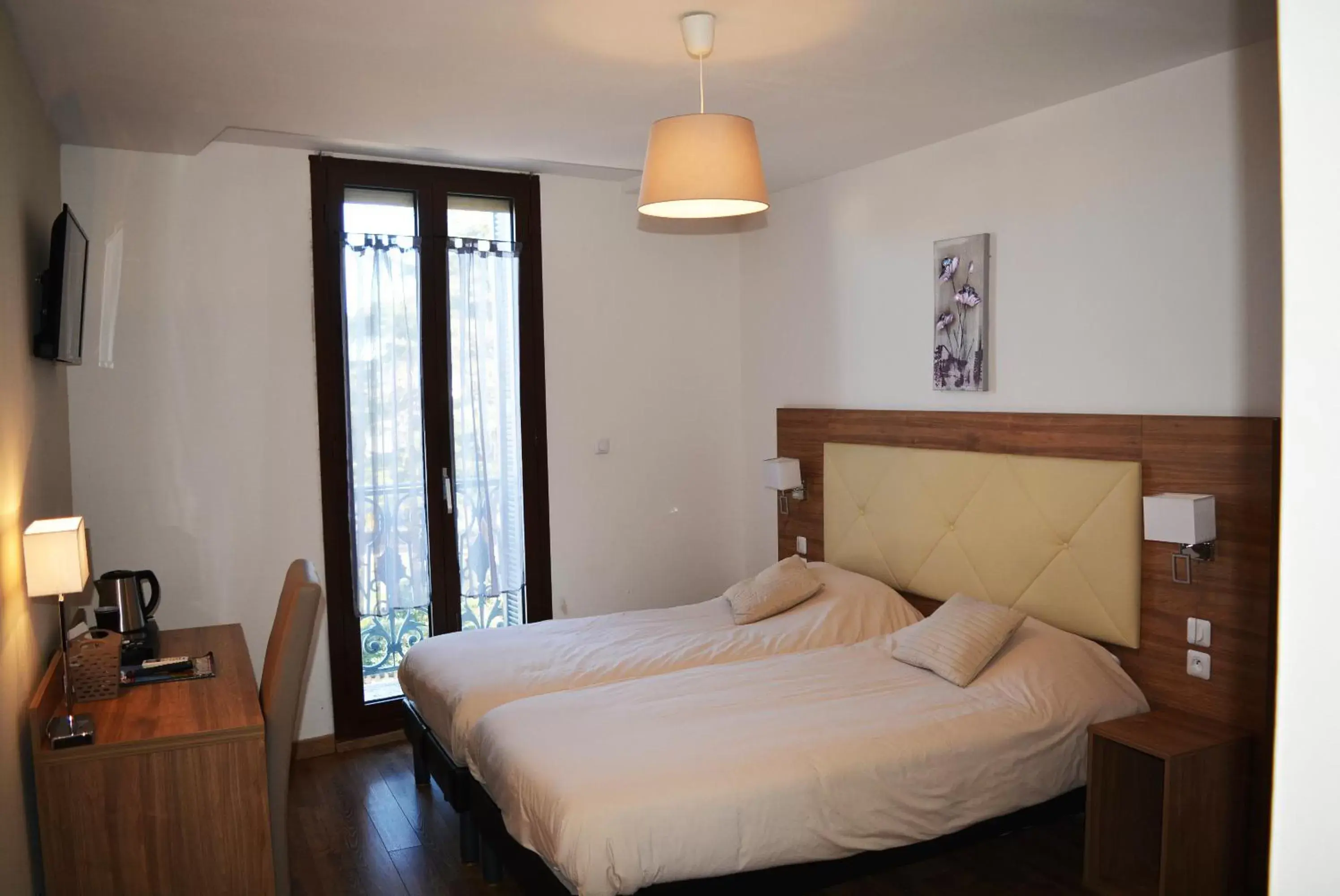 Superior Twin Room in Le Grand Hôtel Molière Superior Twin Room in Le Grand Hôtel Molière