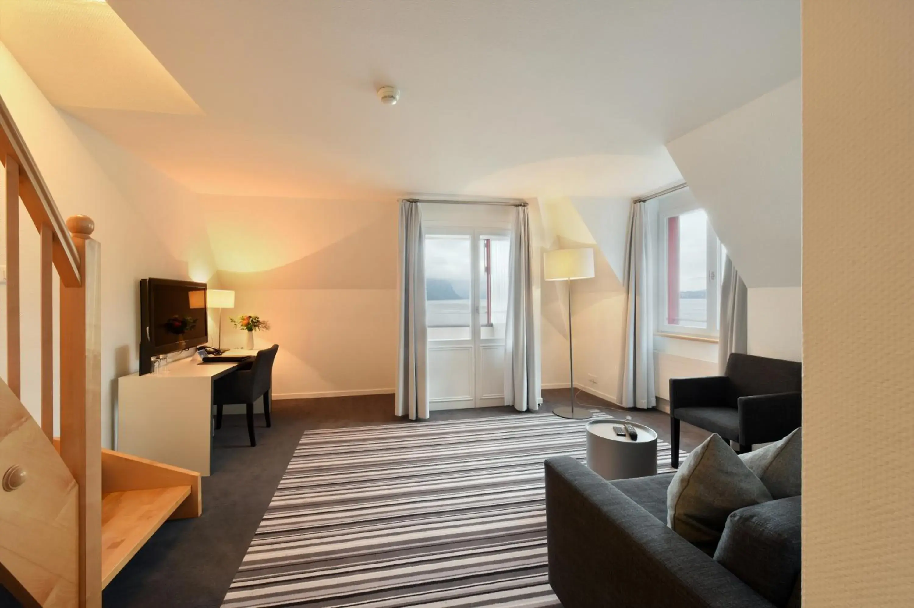 Family Room with Lake View in Hotel Vitznauerhof - Lifestyle Hideaway at Lake Lucerne Family Room with Lake View in Hotel Vitznauerhof - Lifestyle Hideaway at Lake Lucerne