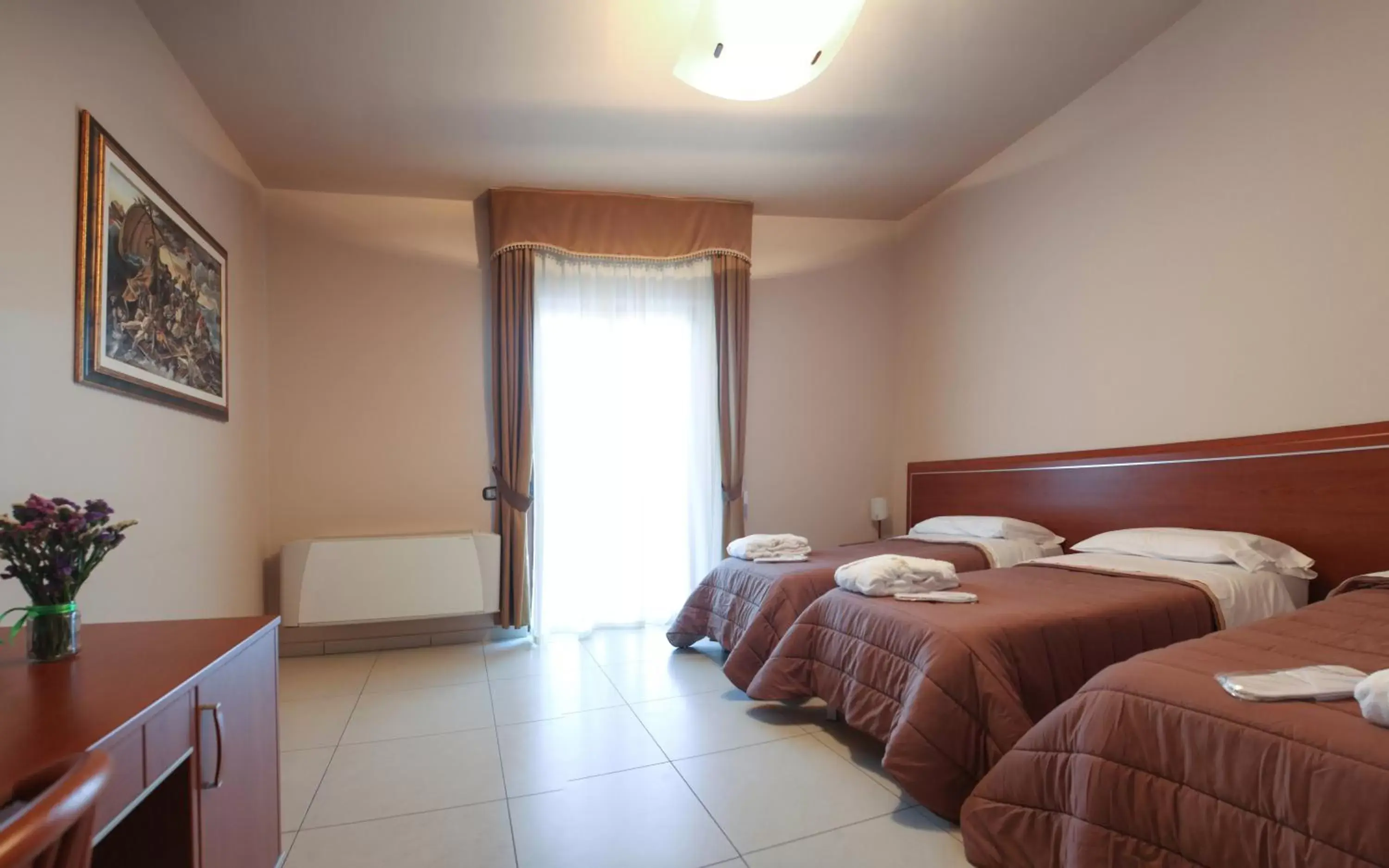 Triple Room in Hotel Ruffirio Triple Room in Hotel Ruffirio