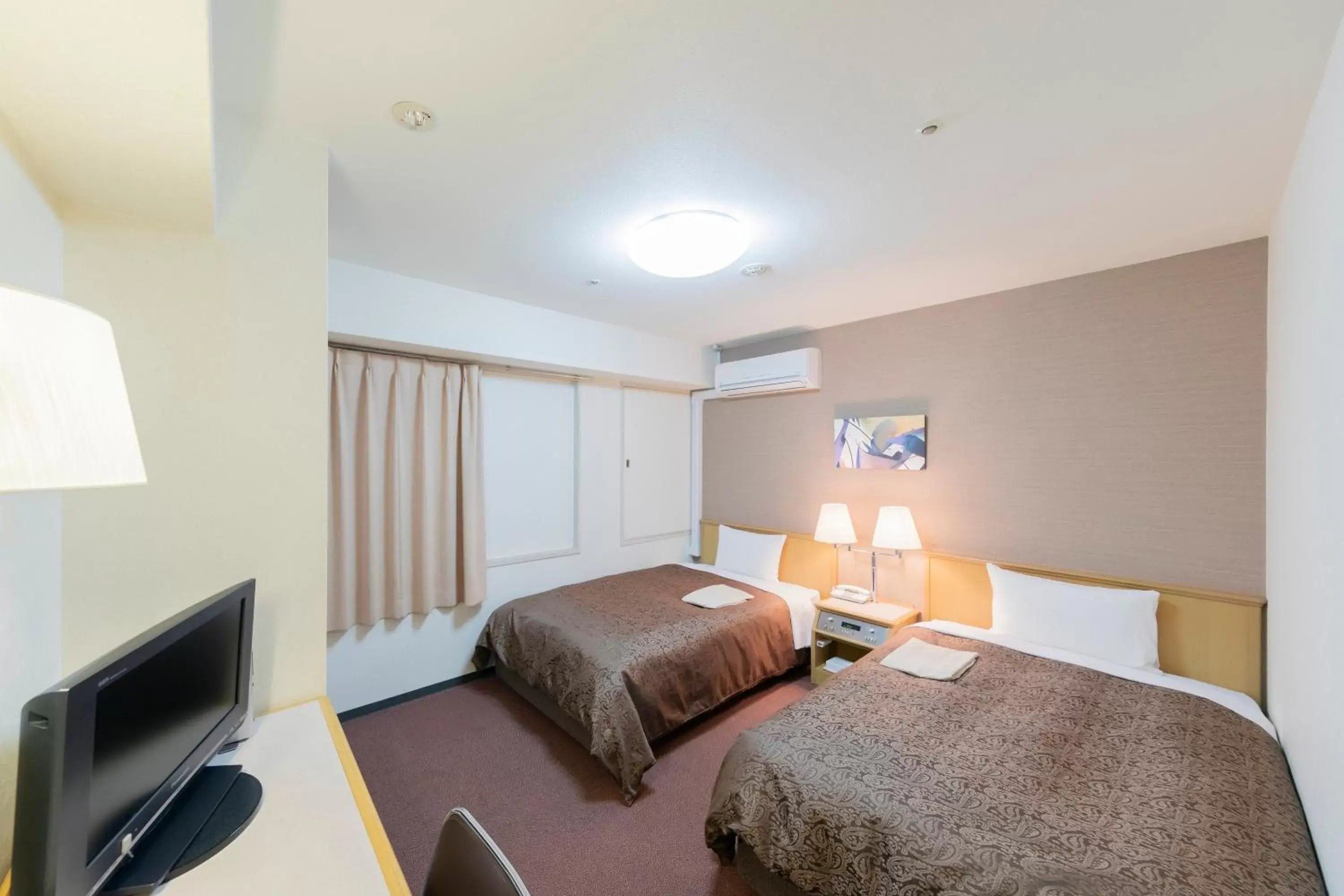 Twin Room - Main Building - Non Smoking in Sunny Stone Hotel Twin Room - Main Building - Non Smoking in Sunny Stone Hotel