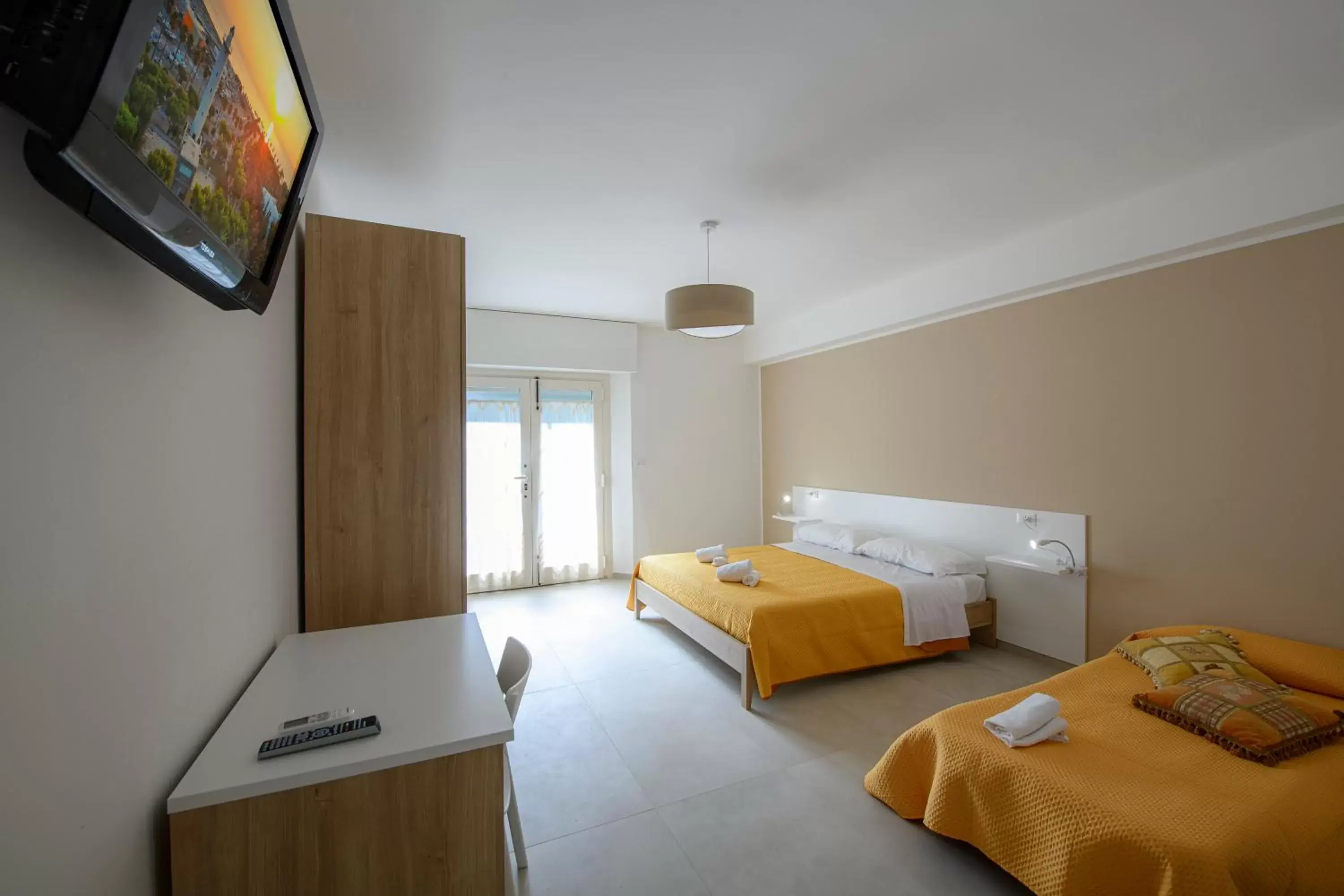 Bed, TV/Entertainment Center in B&B La Fontanella Bed, TV/Entertainment Center in B&B La Fontanella