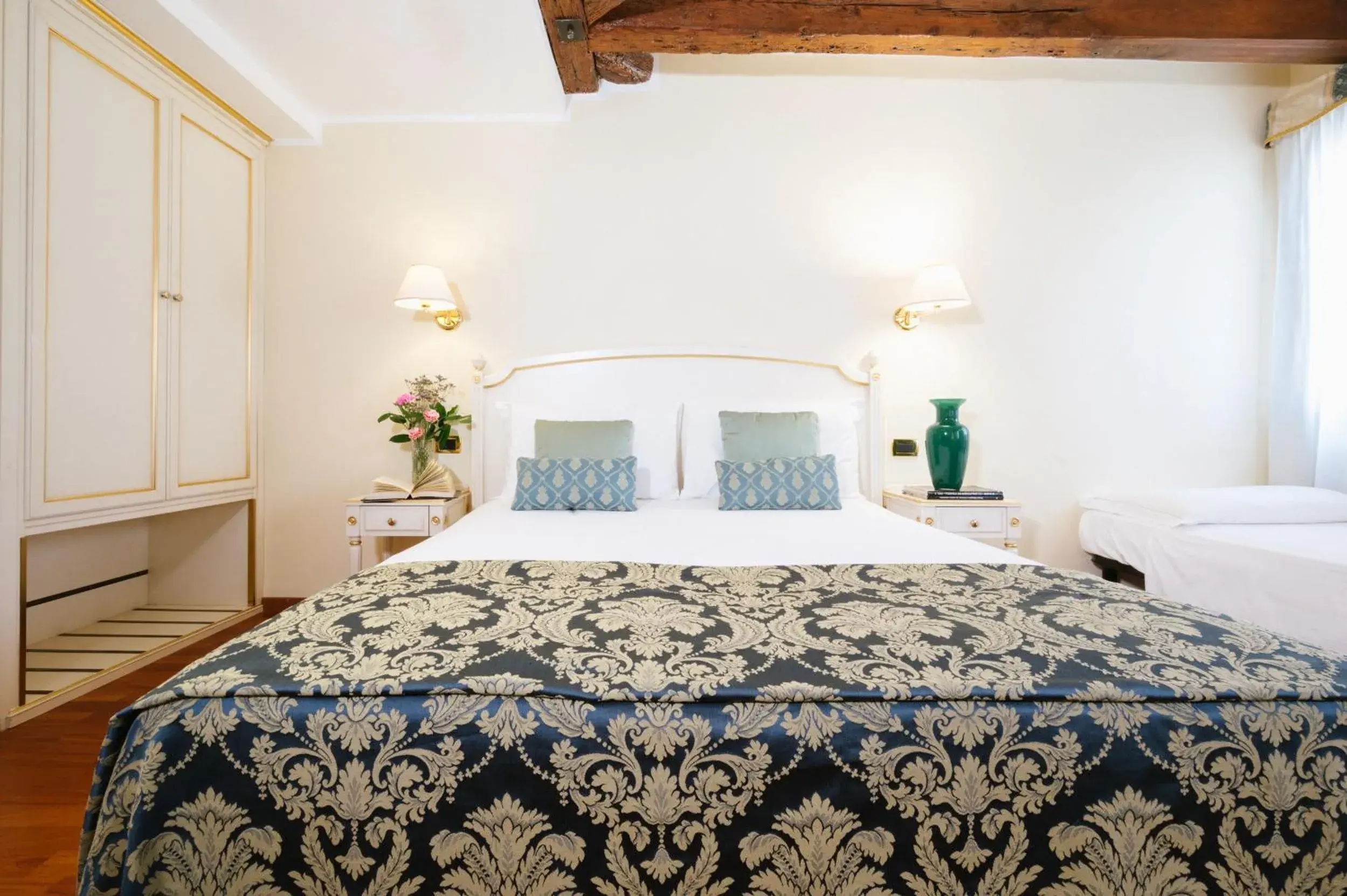 Deluxe Triple Room in Hotel Do Pozzi Deluxe Triple Room in Hotel Do Pozzi