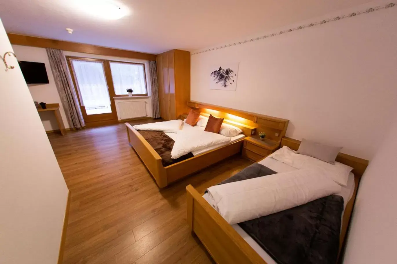 Triple Room with Balcony in Almhotel Bergerhof Triple Room with Balcony in Almhotel Bergerhof