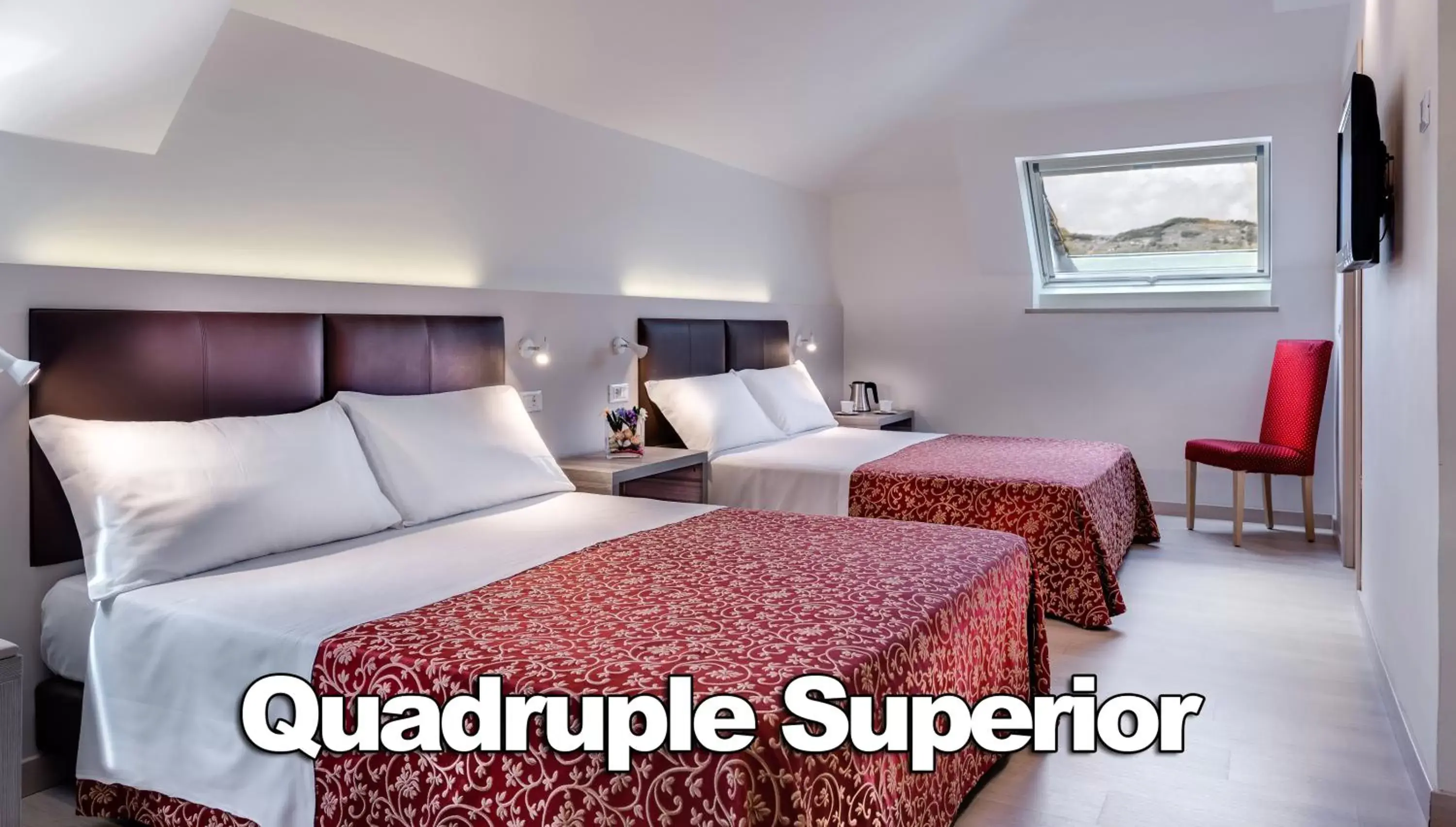 Superior Quadruple Room in Hotel Boston Superior Quadruple Room in Hotel Boston