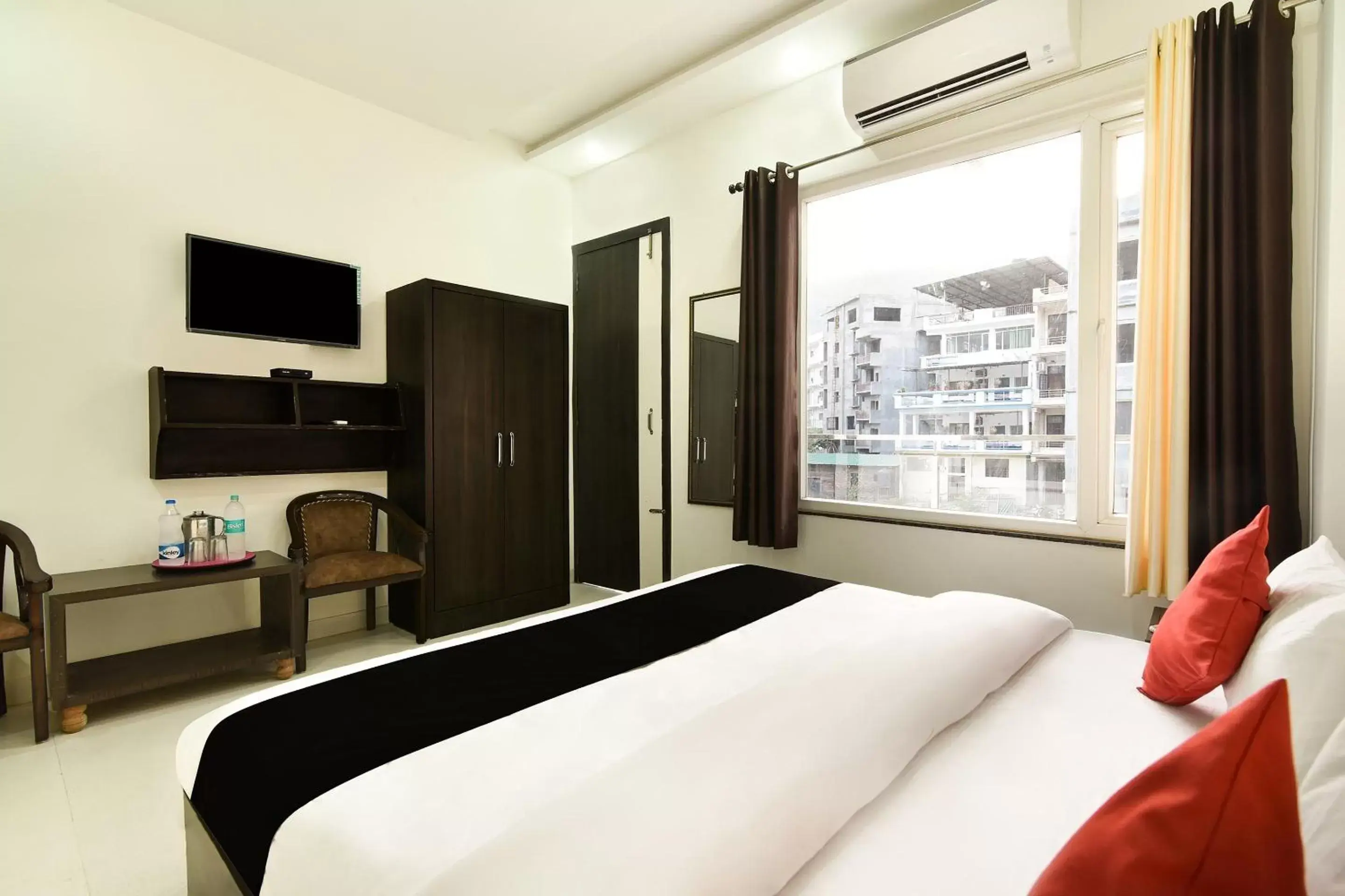 Deluxe Double Room in Capital O Yogasthali Inn Hotel And Spa Deluxe Double Room in Capital O Yogasthali Inn Hotel And Spa