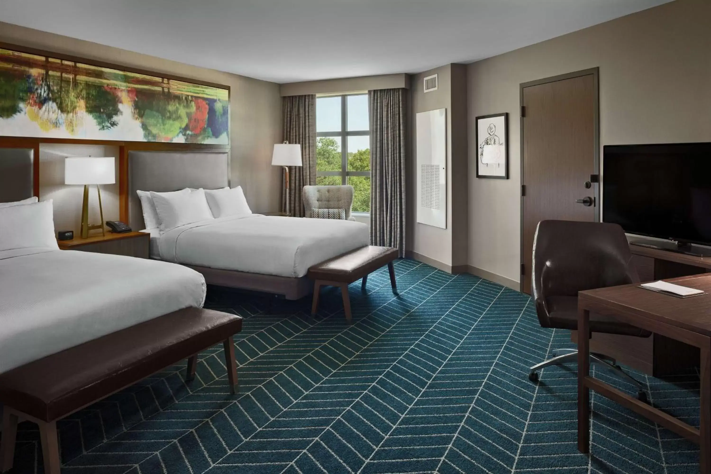 Queen Room with Two Queen Beds and Roll-In Shower - Mobility and Hearing Access in The Bevy Hotel Boerne, A Doubletree By Hilton Queen Room with Two Queen Beds and Roll-In Shower - Mobility and Hearing Access in The Bevy Hotel Boerne, A Doubletree By Hilton